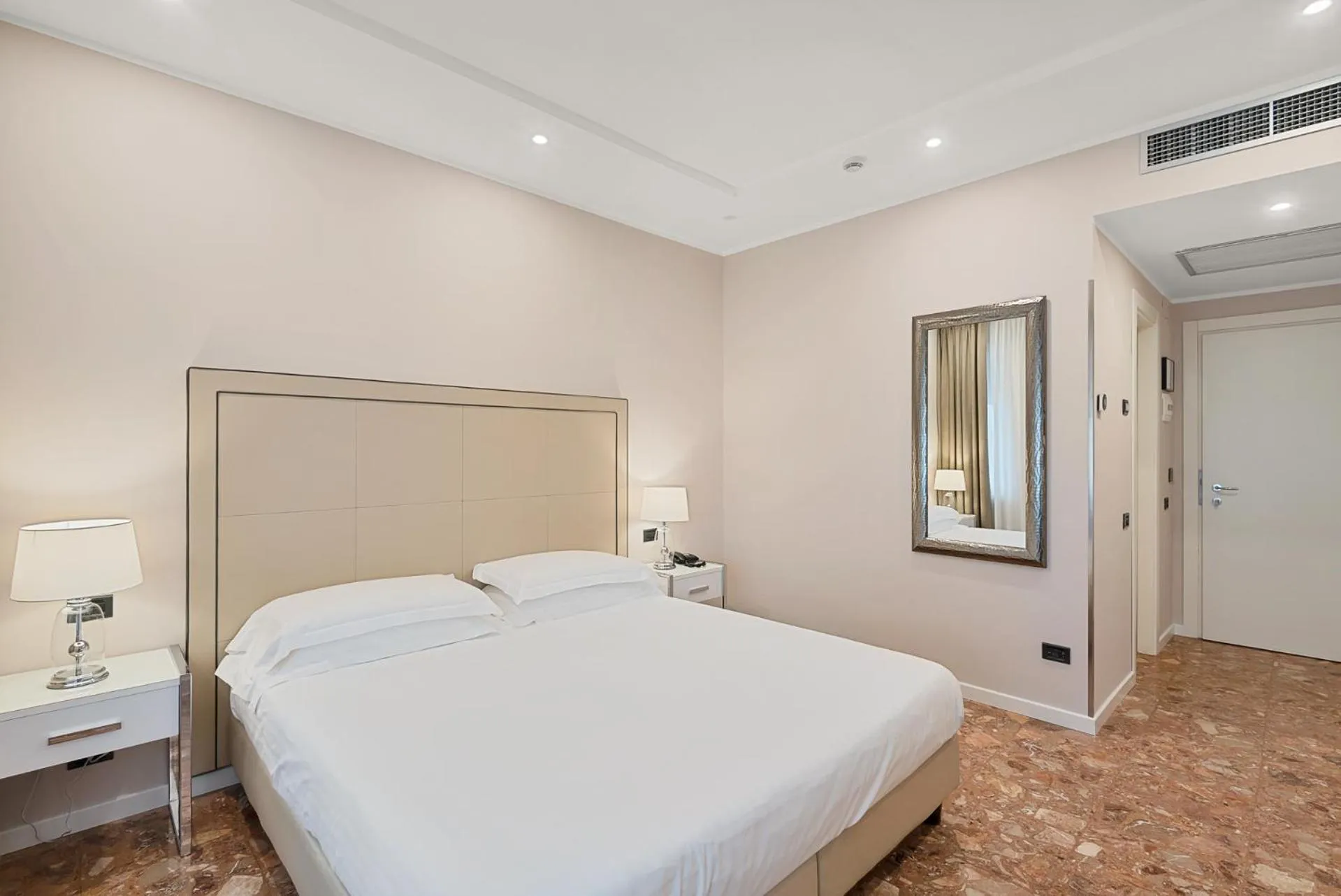 Bed in Hotel Excelsior