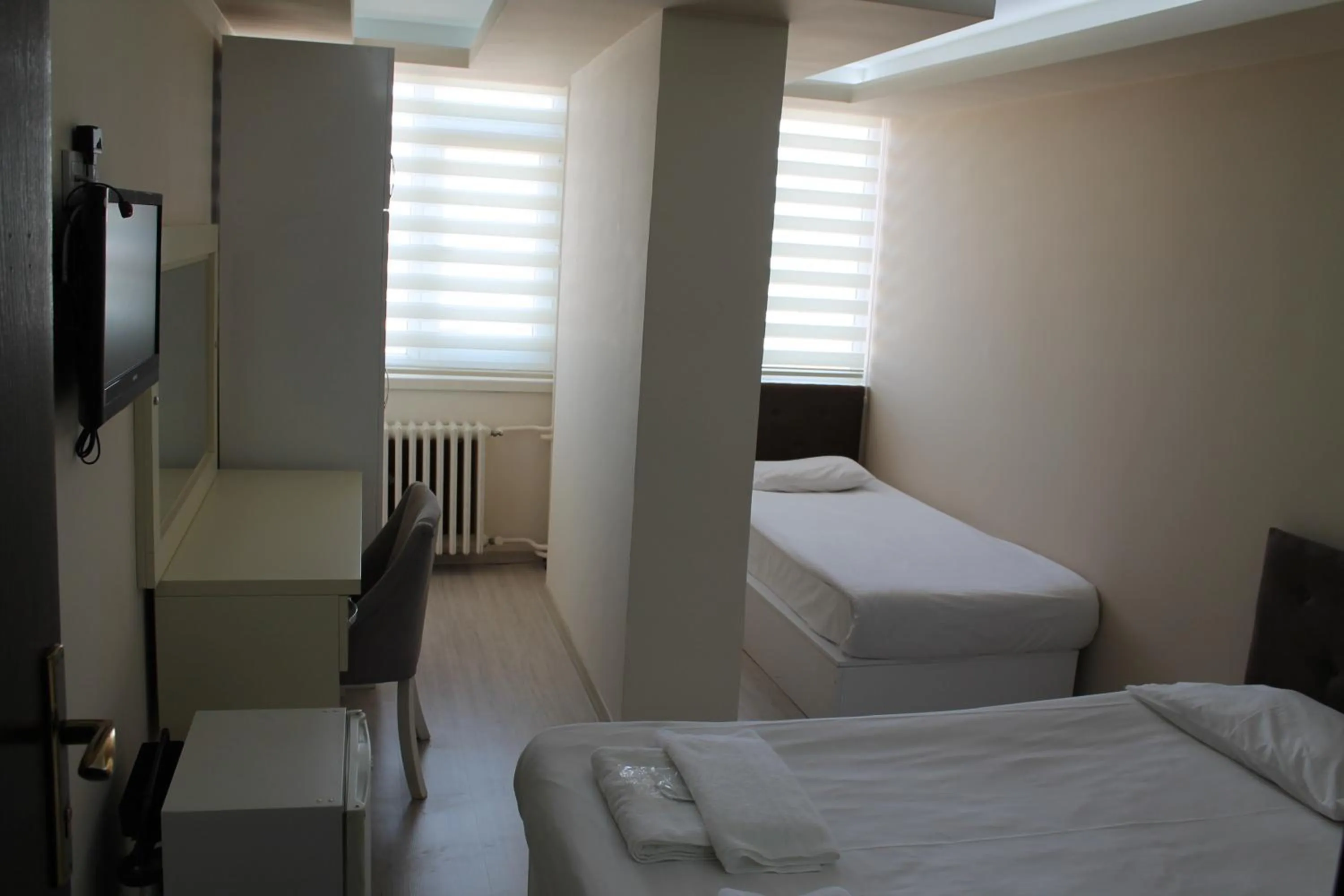 Bed in Hotel Abro Necatibey