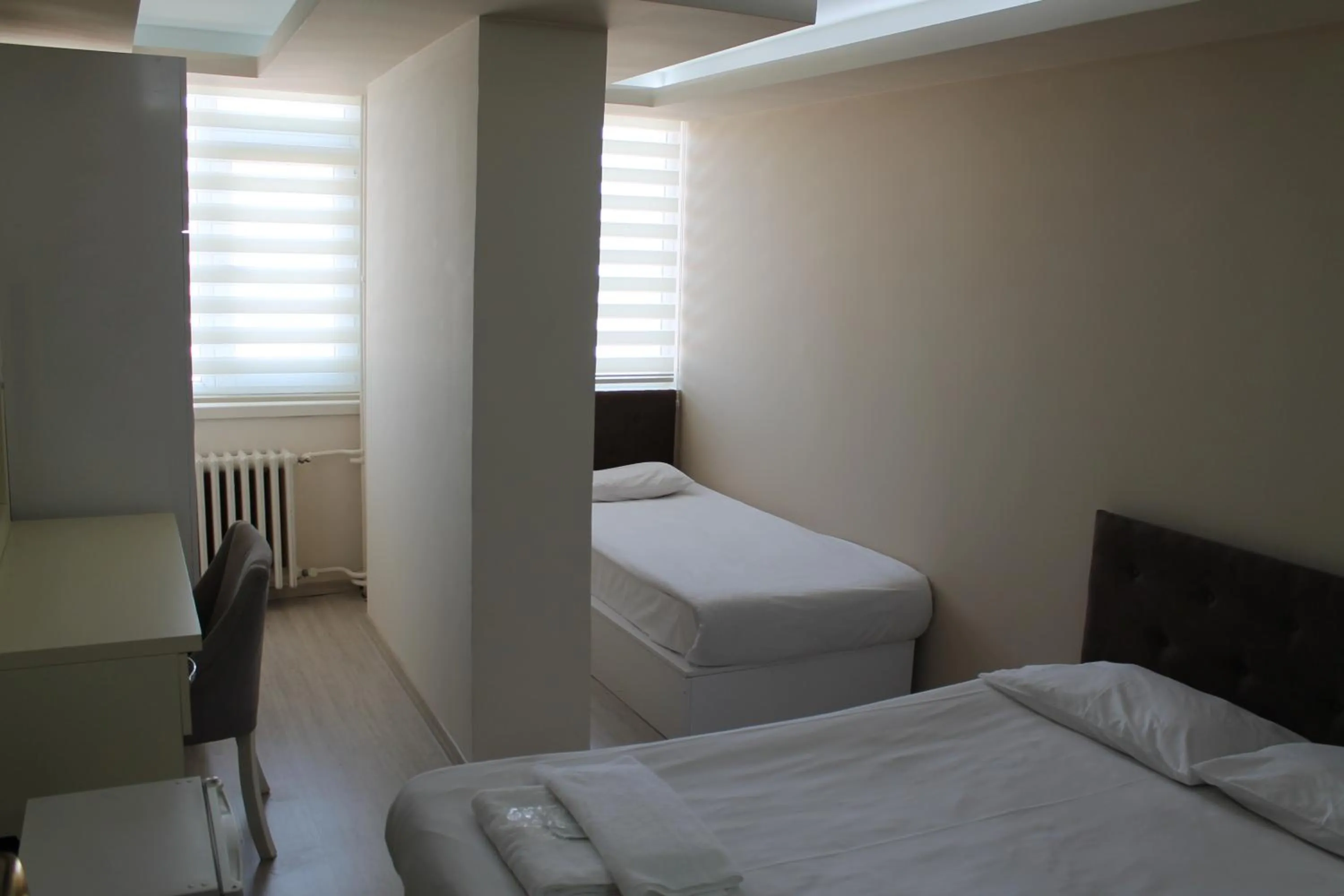 Bed in Hotel Abro Necatibey