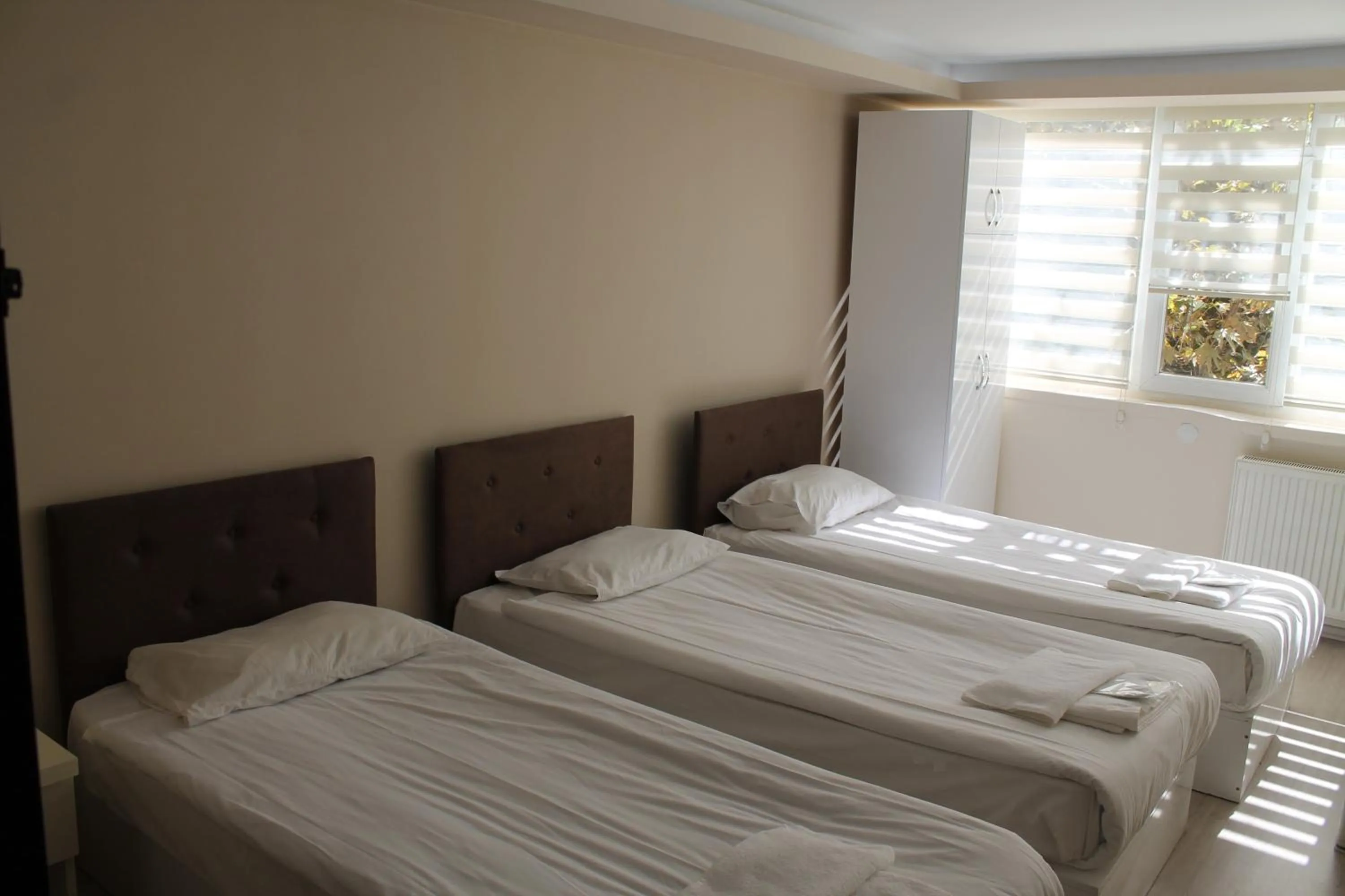 Bed in Hotel Abro Necatibey