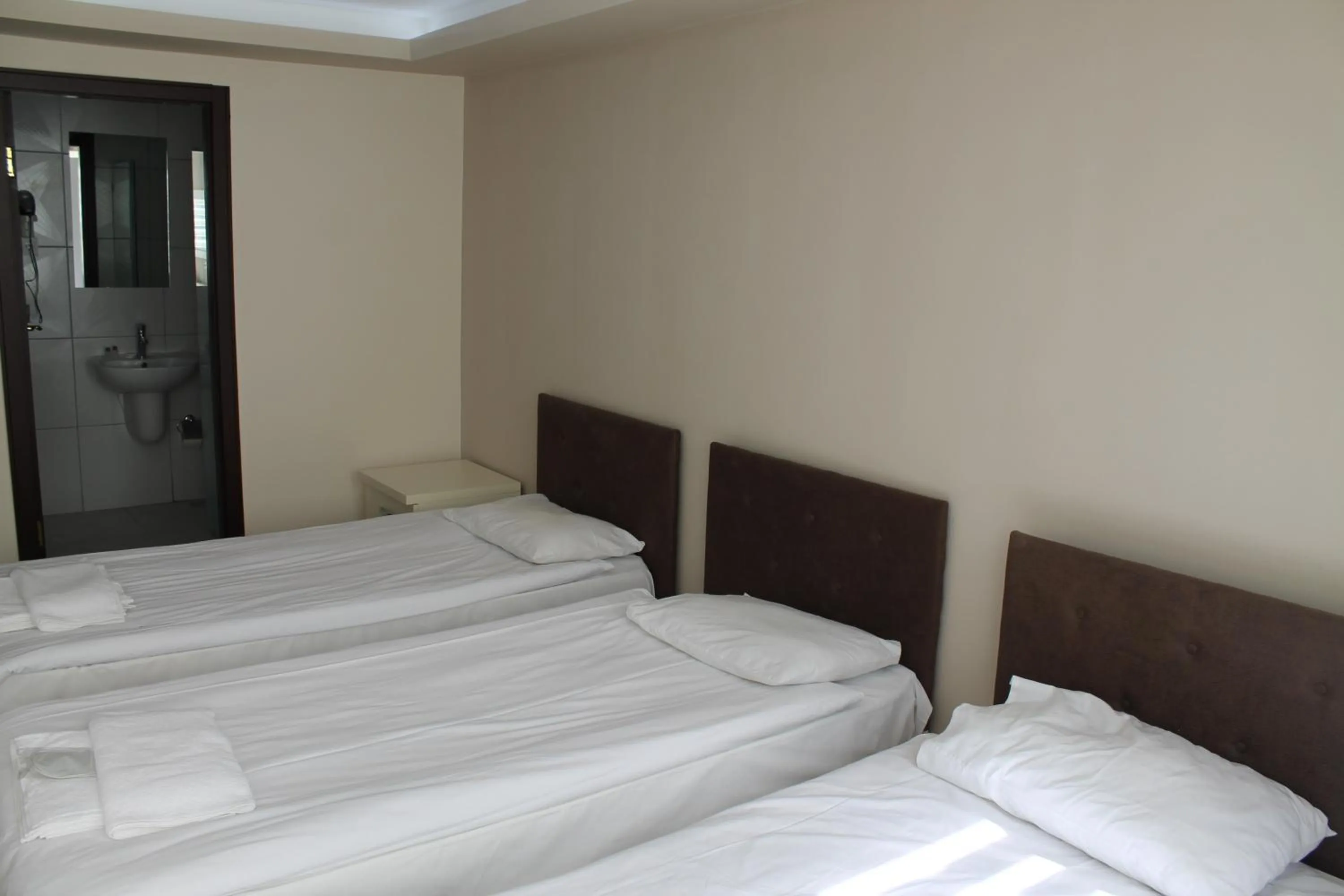 Bed in Hotel Abro Necatibey