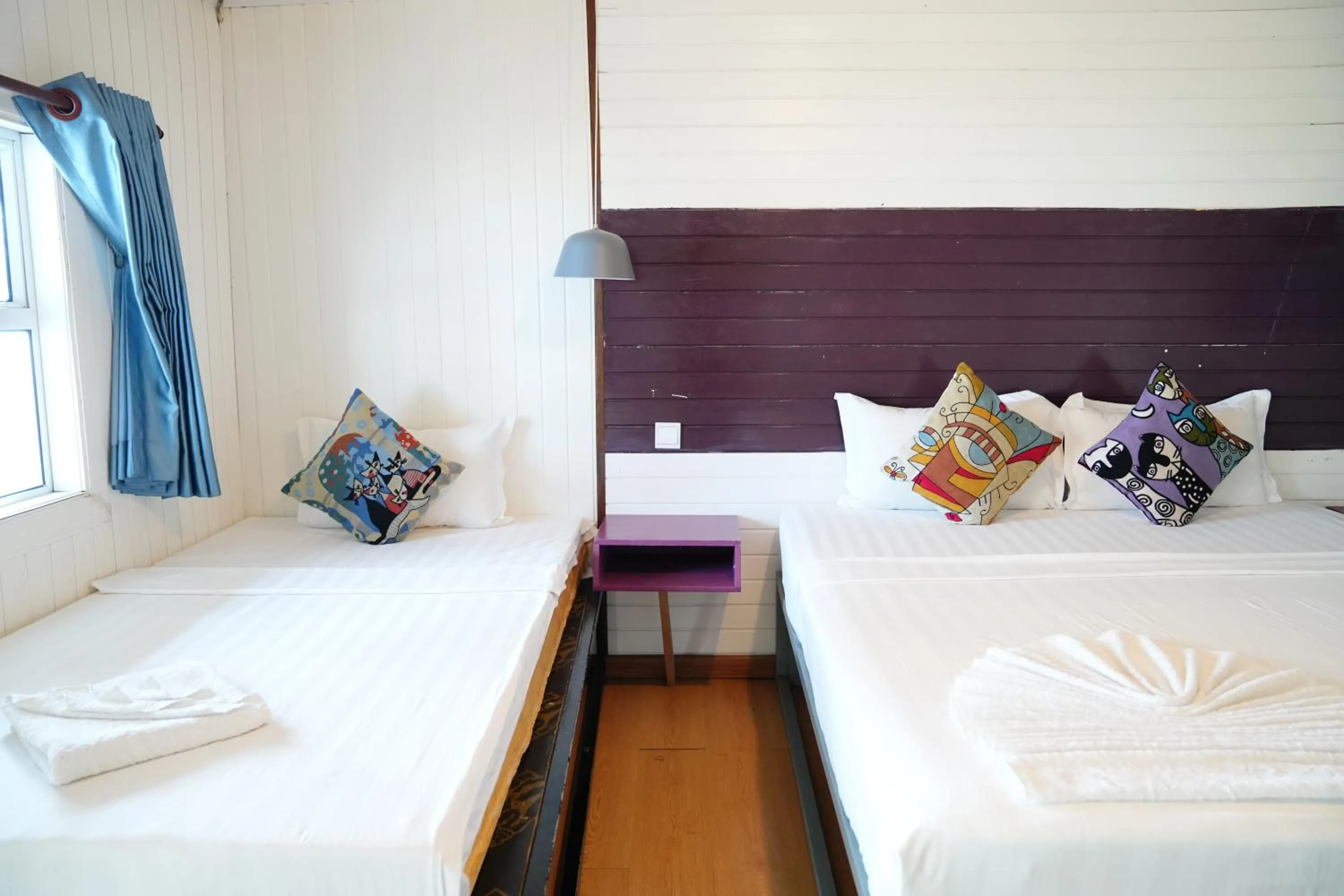 Bed in Sandy Beach Bungalows by EHM