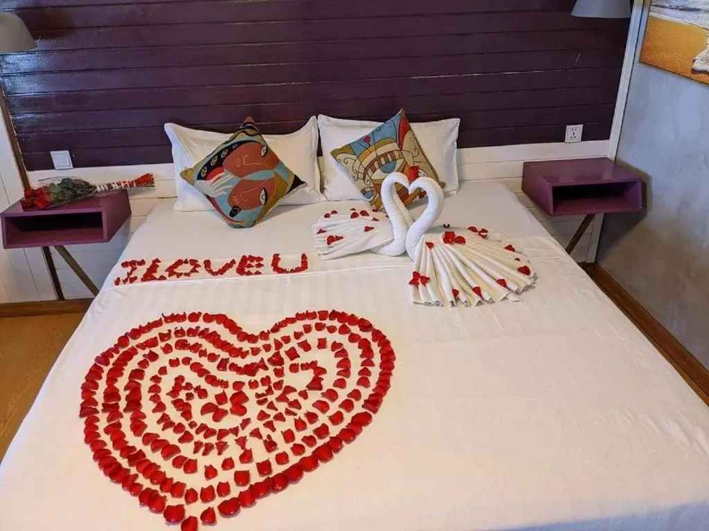 Bed in Sandy Beach Bungalows by EHM