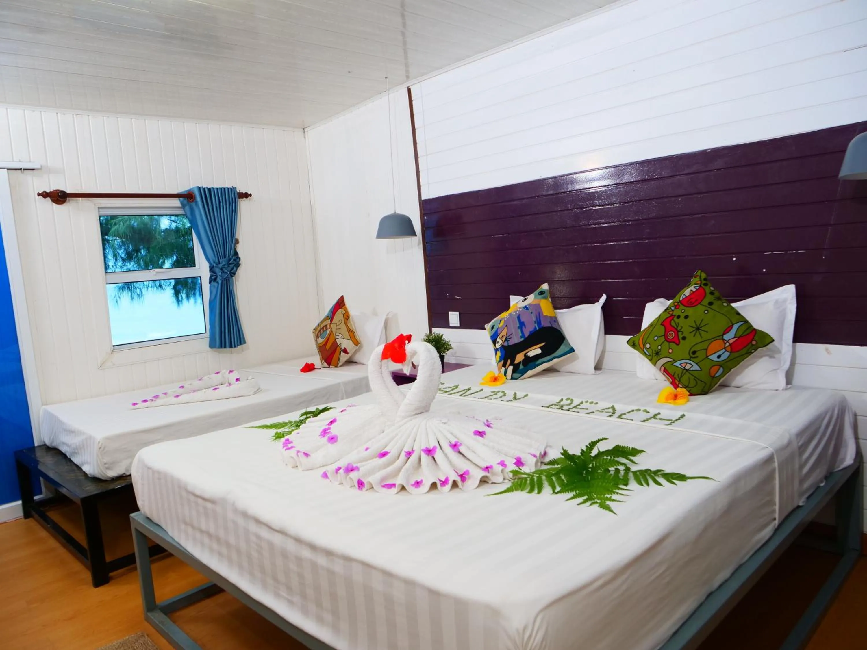 Bed in Sandy Beach Bungalows by EHM