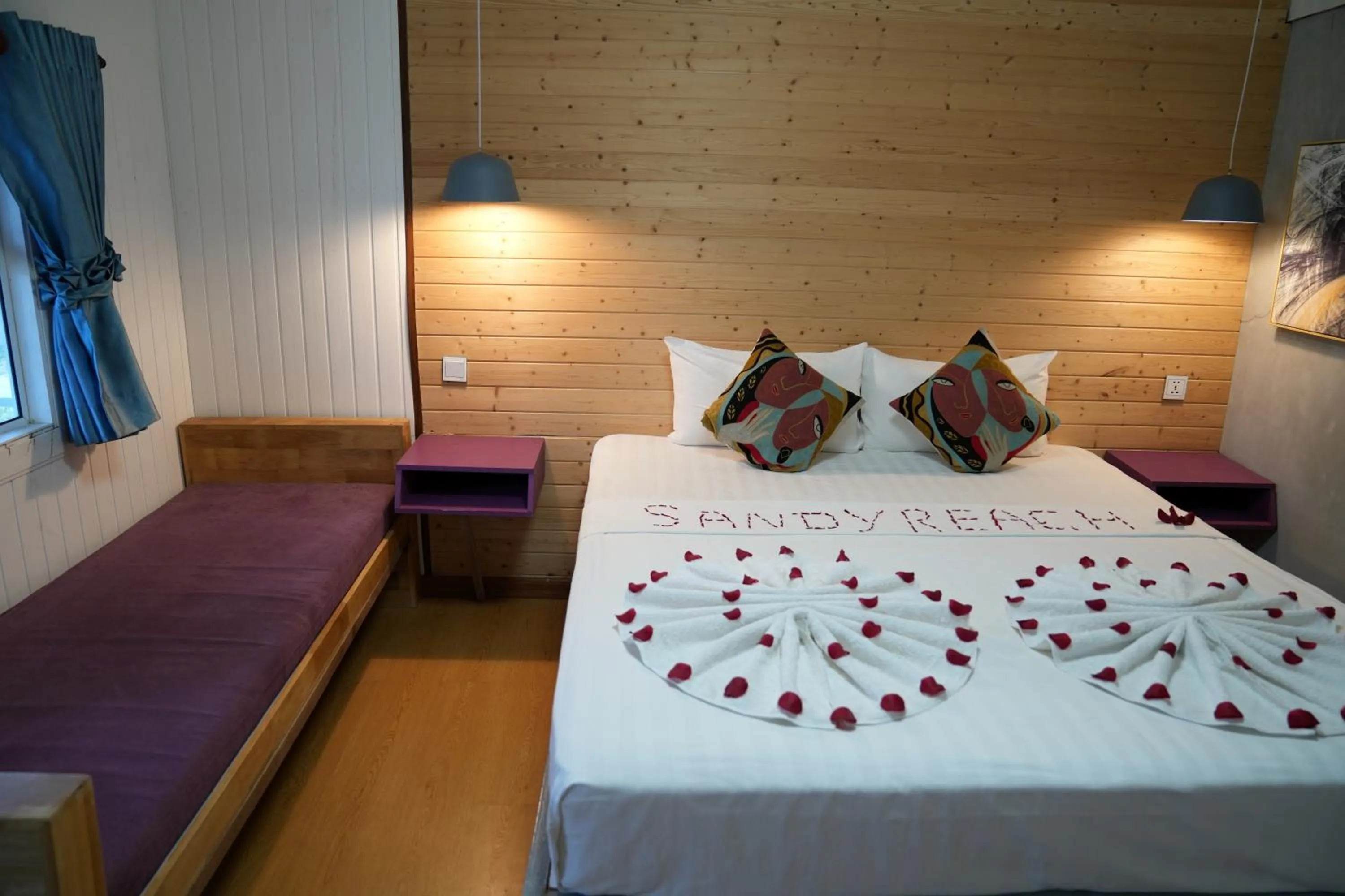 Bed in Sandy Beach Bungalows by EHM