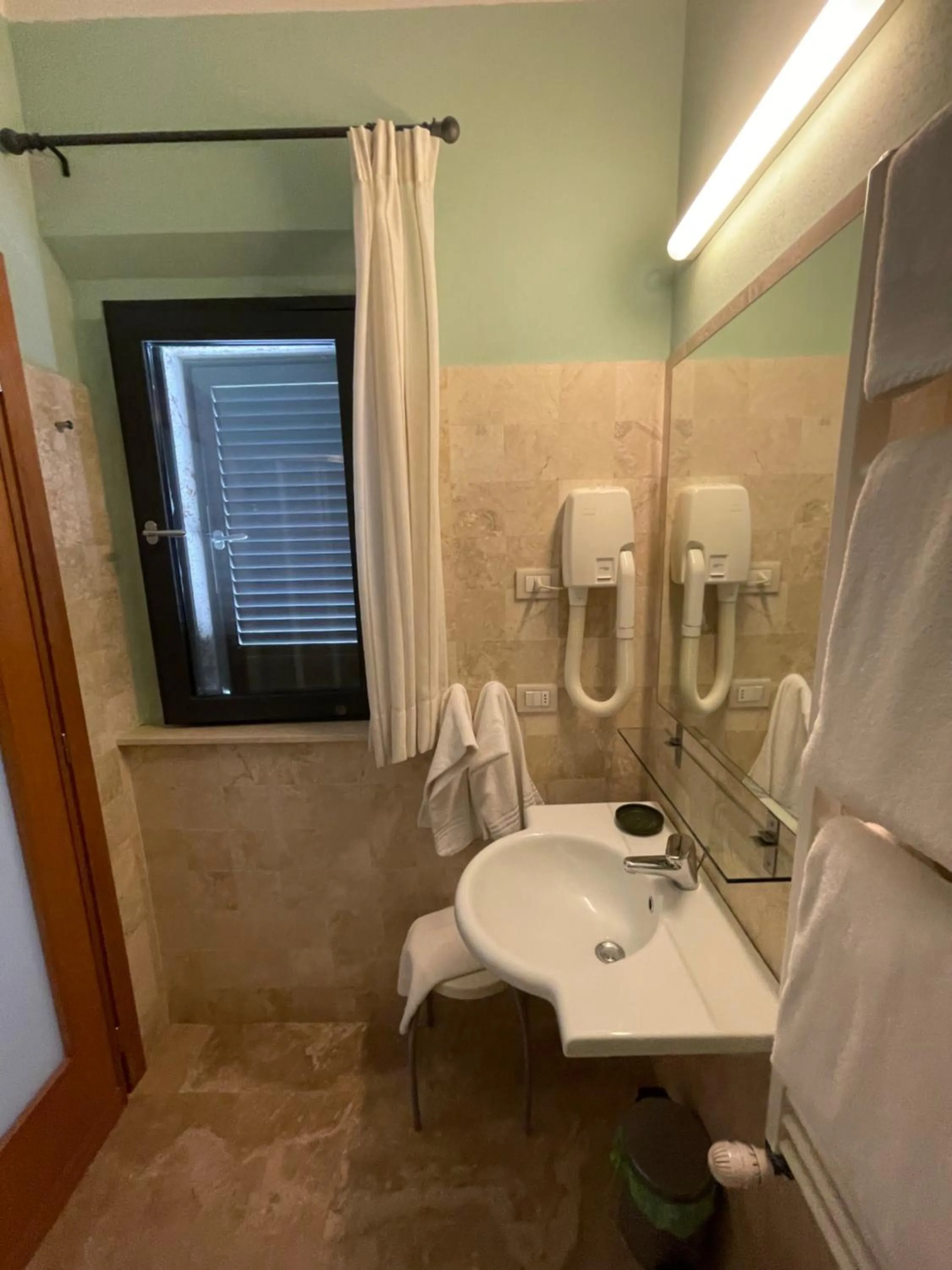 Bathroom in Hotel Poggio Bertino