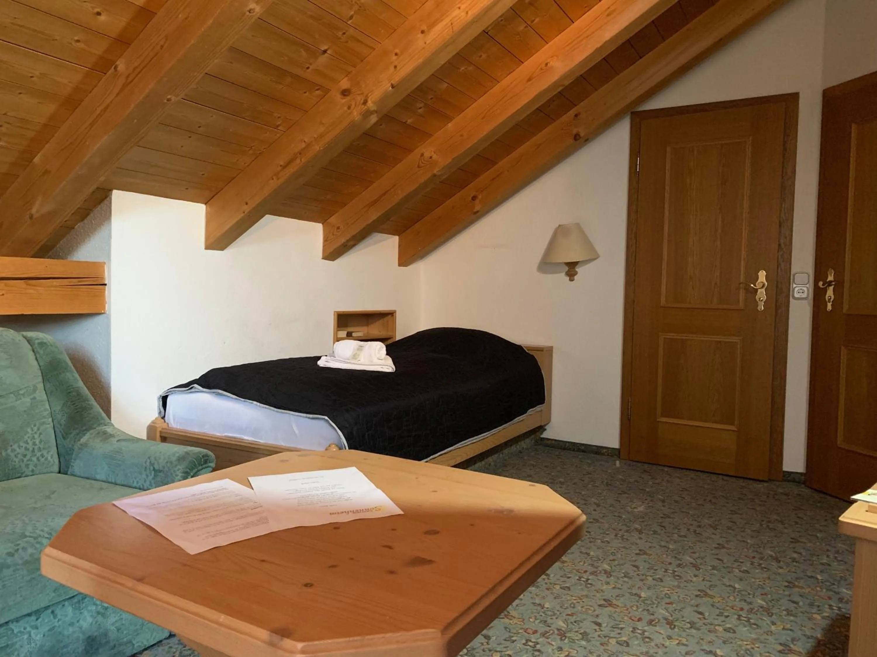 Photo of the whole room, Bed in Gasthof Sonnenheim