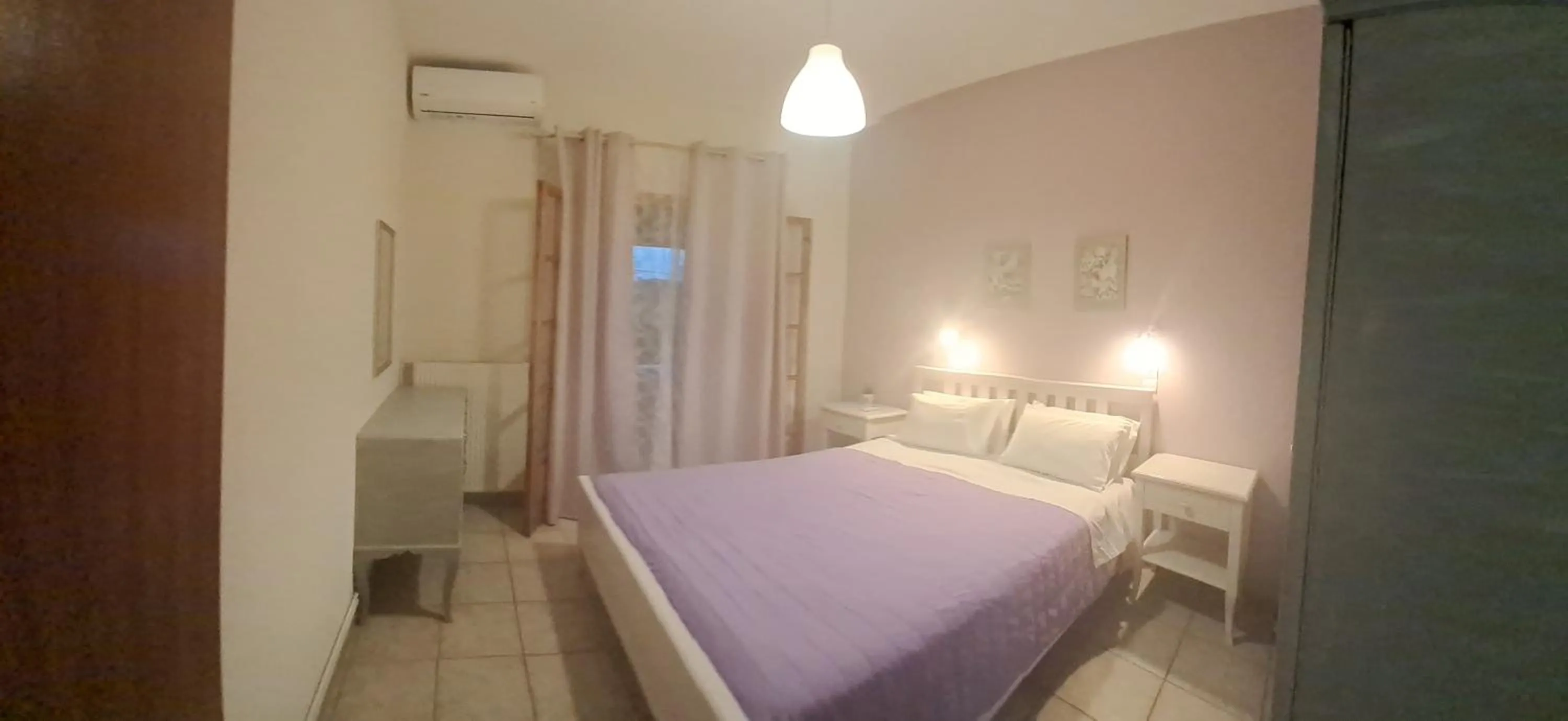 Garden view, Bed in Olga's Garden Apartments