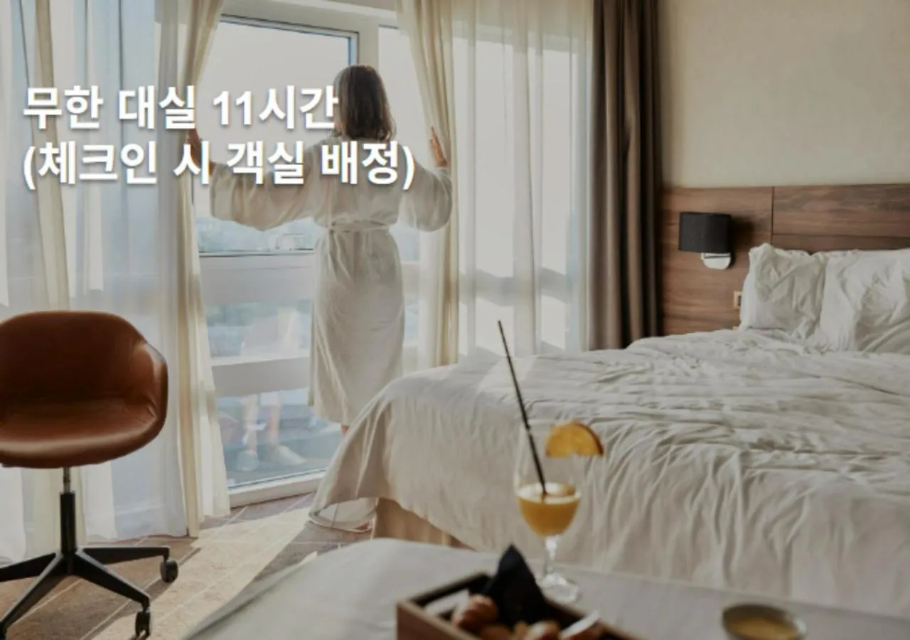 Text overlay, Bed in Mokpo New Evergreen Hotel