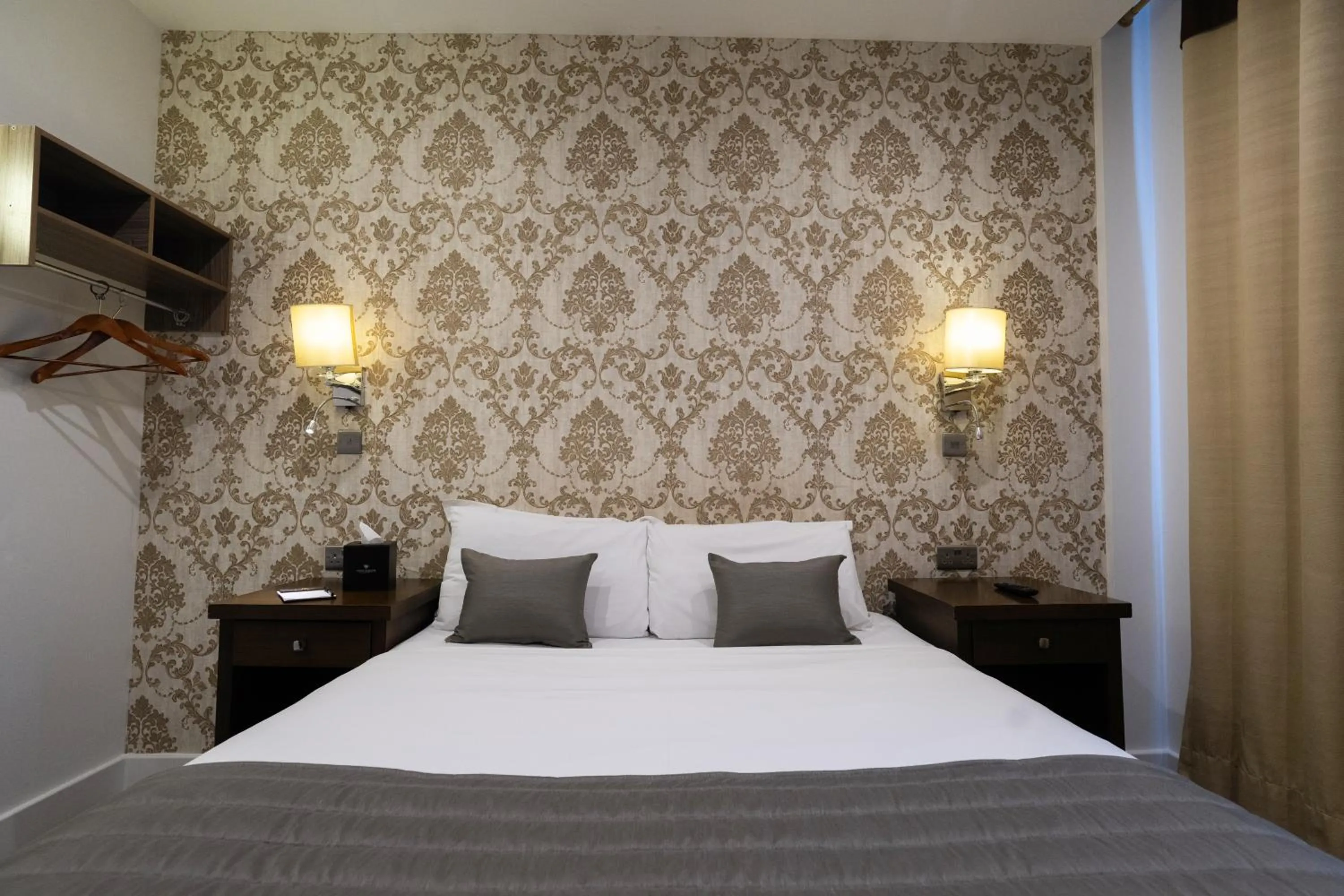 Bed in Grand Sapphire Hotel & Banqueting