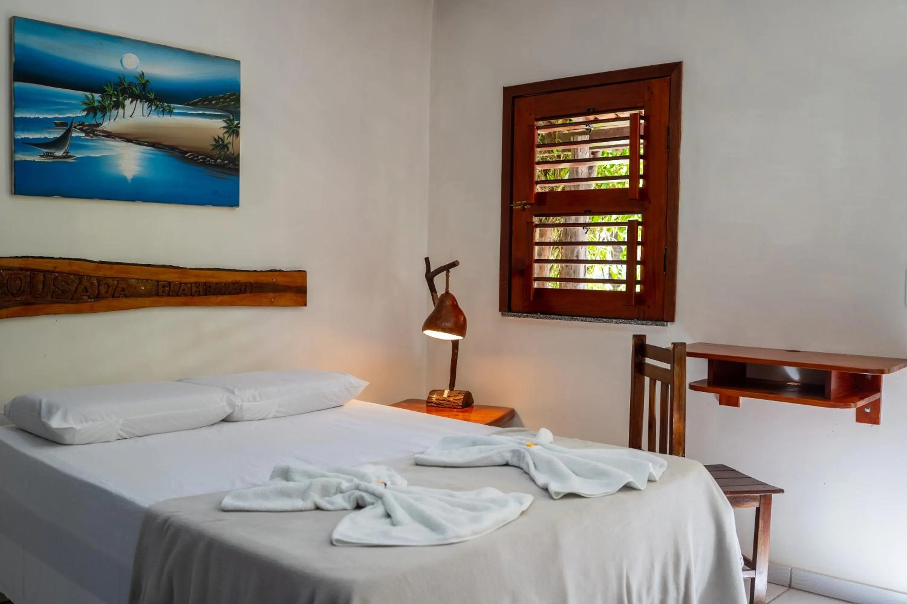 Photo of the whole room, Bed in Pousada Flambaião