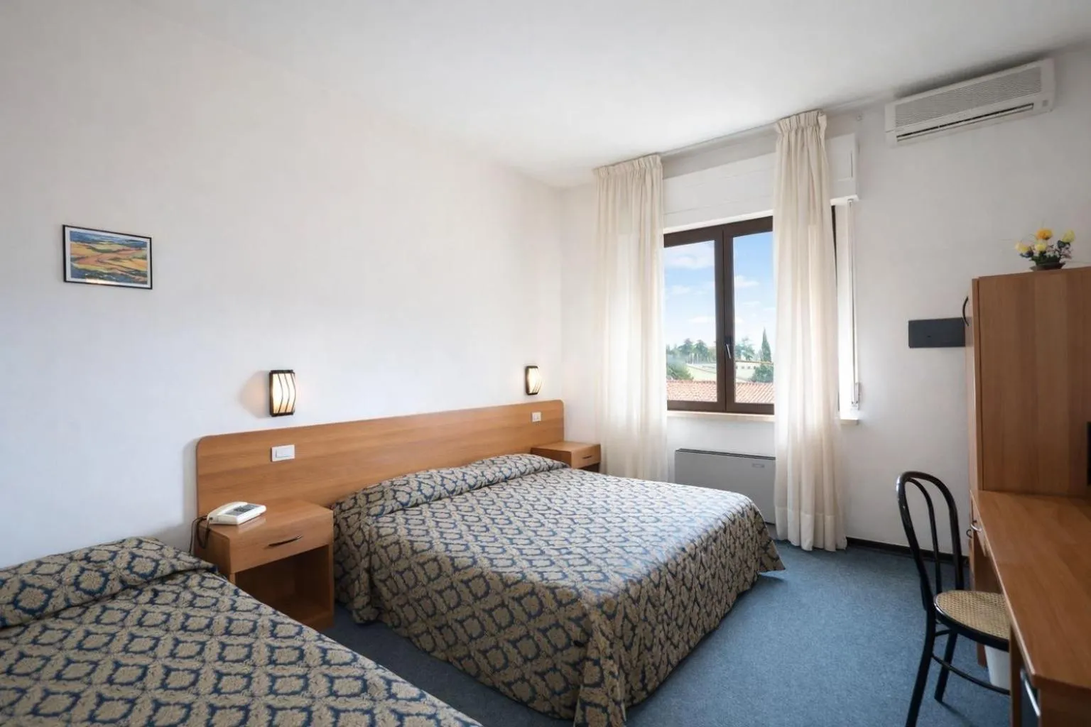 Bed in Hotel Granducato