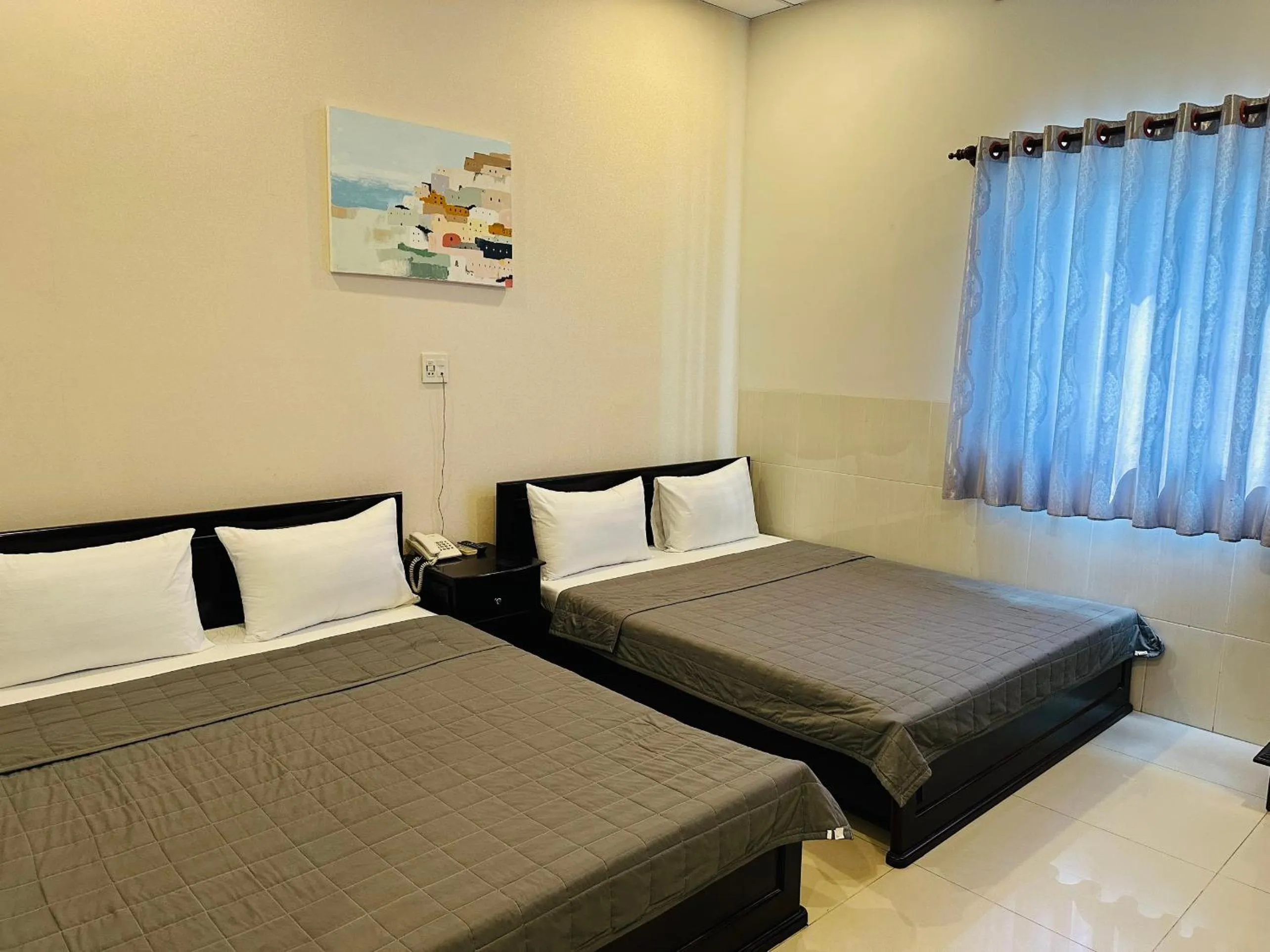 Bed in Phuong Nam Hotel An Giang