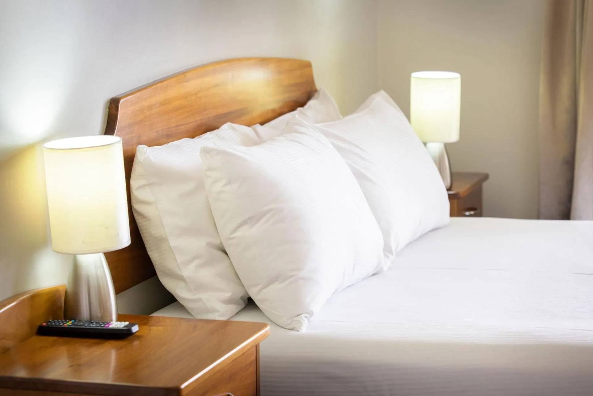 Bed in Shamrock Gardens Motel