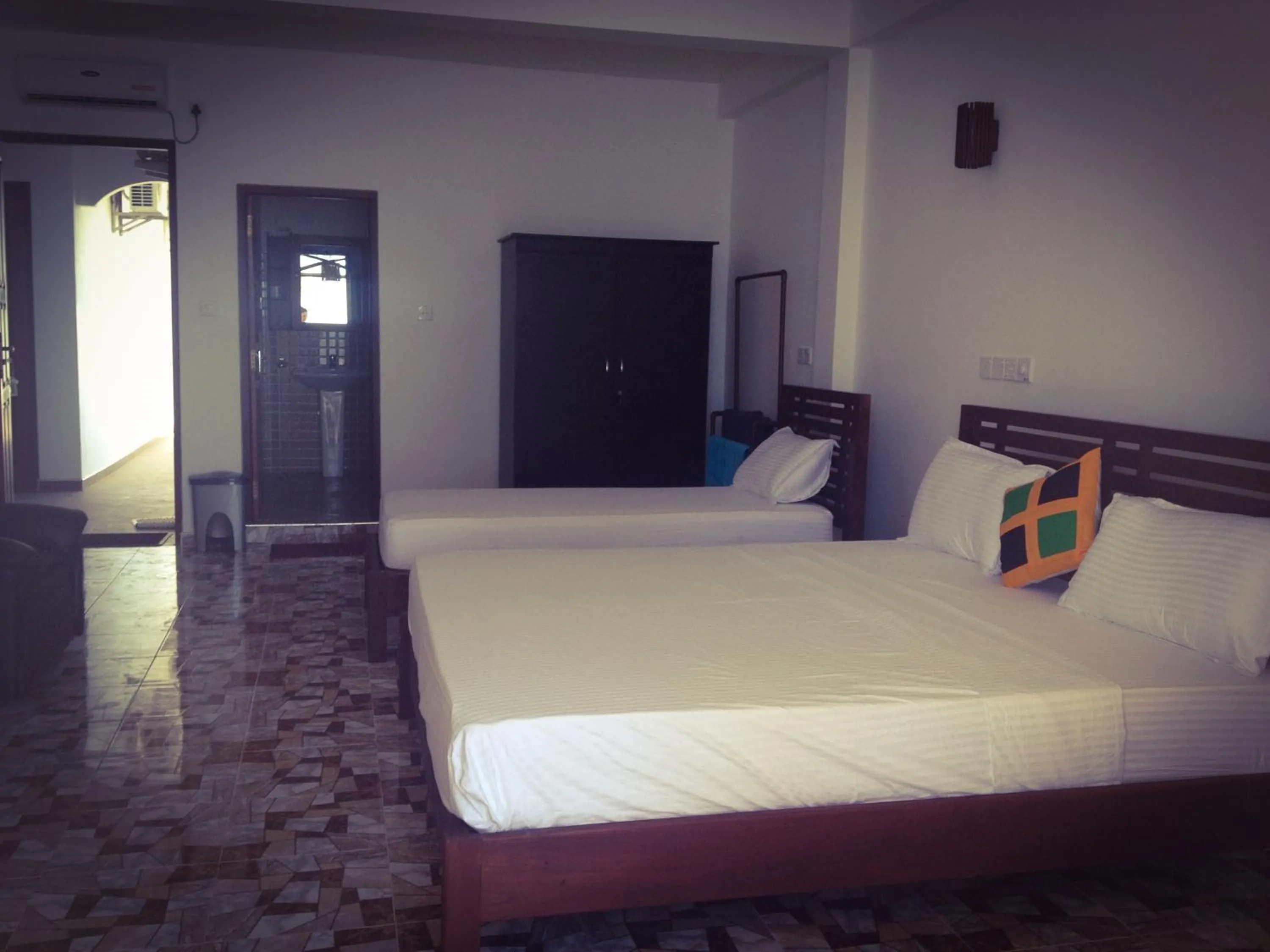 Photo of the whole room, Bed in Mirissa Seastar