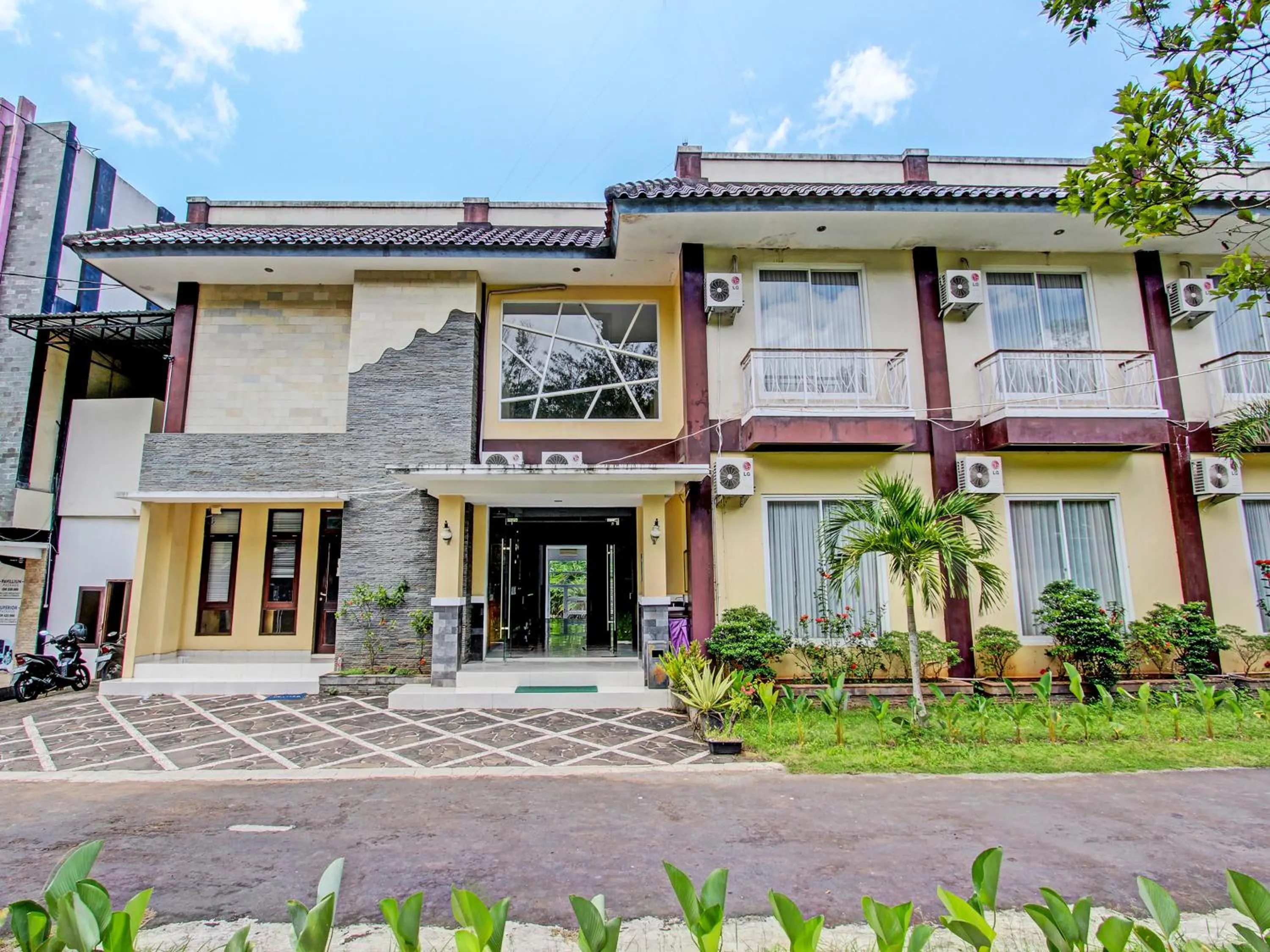 Property building in Collection O Hotel By Orchid