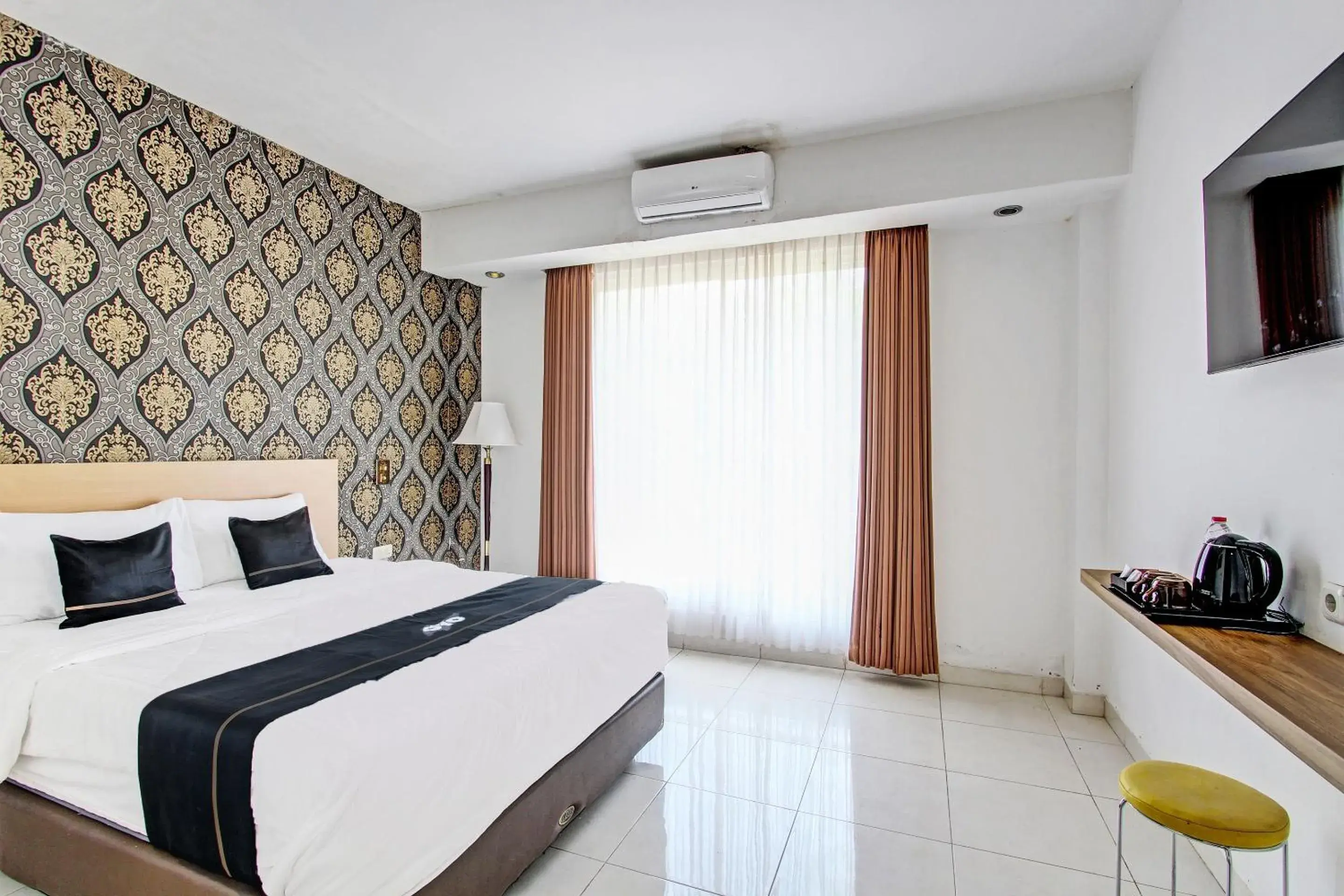 Deluxe Double Room in Collection O Gunung Kidul Near Pindul Cave Formerly Orchid Hotel Deluxe Double Room in Collection O Gunung Kidul Near Pindul Cave Formerly Orchid Hotel
