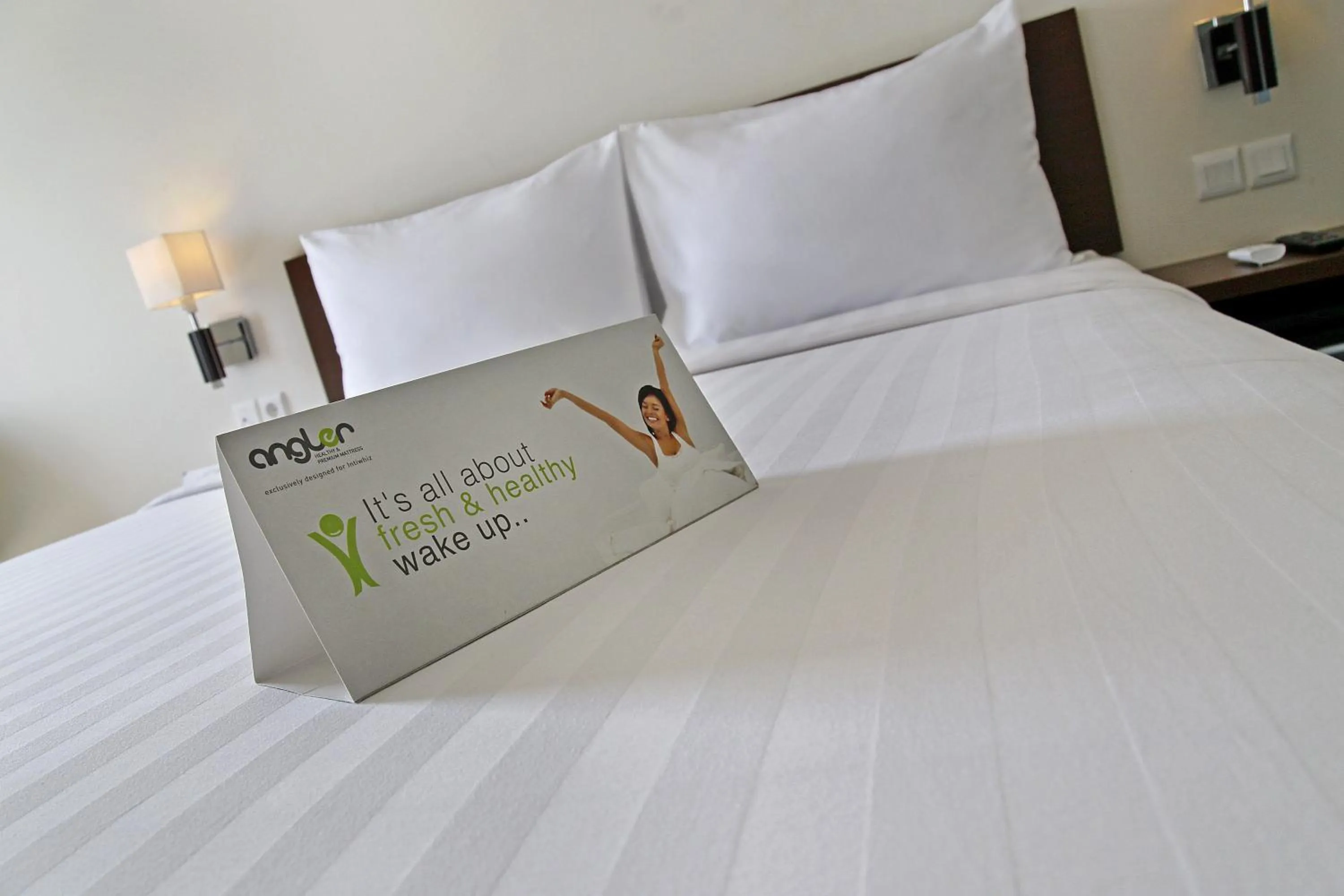 Bed in Whiz Prime Hotel Darmo Harapan Surabaya