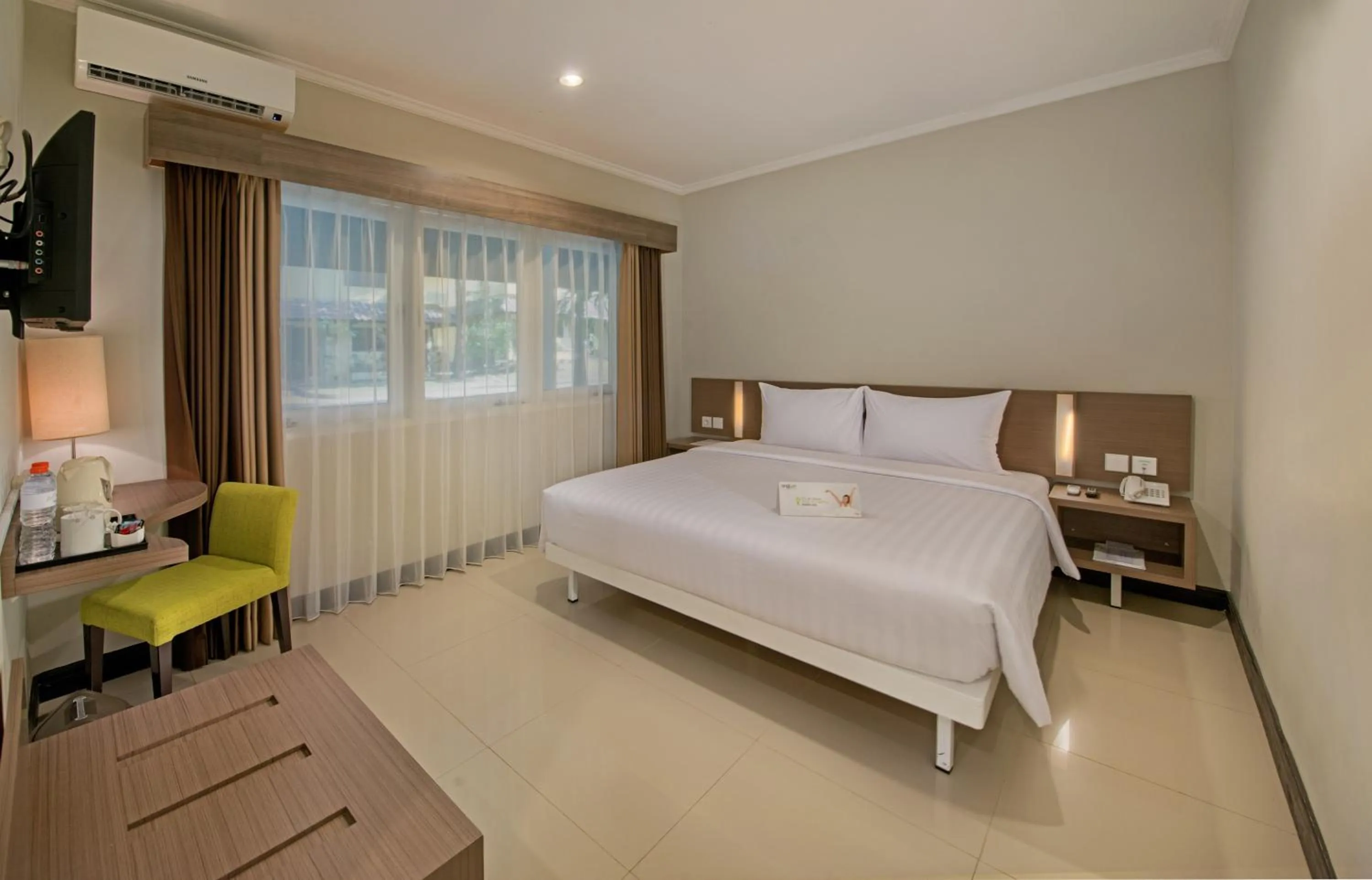 Photo of the whole room in Whiz Prime Hotel Darmo Harapan Surabaya