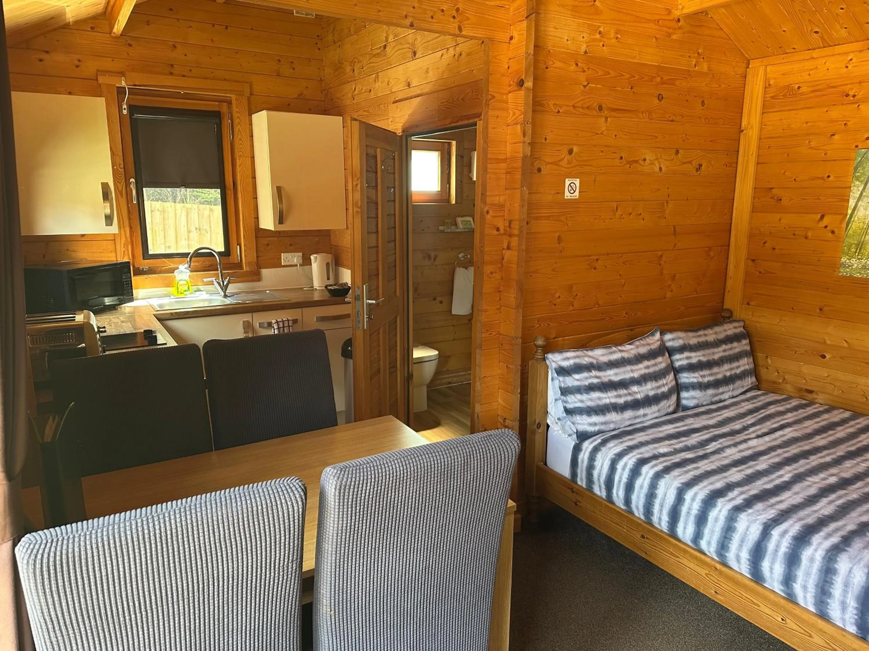 Bed in Forest Edge Motel