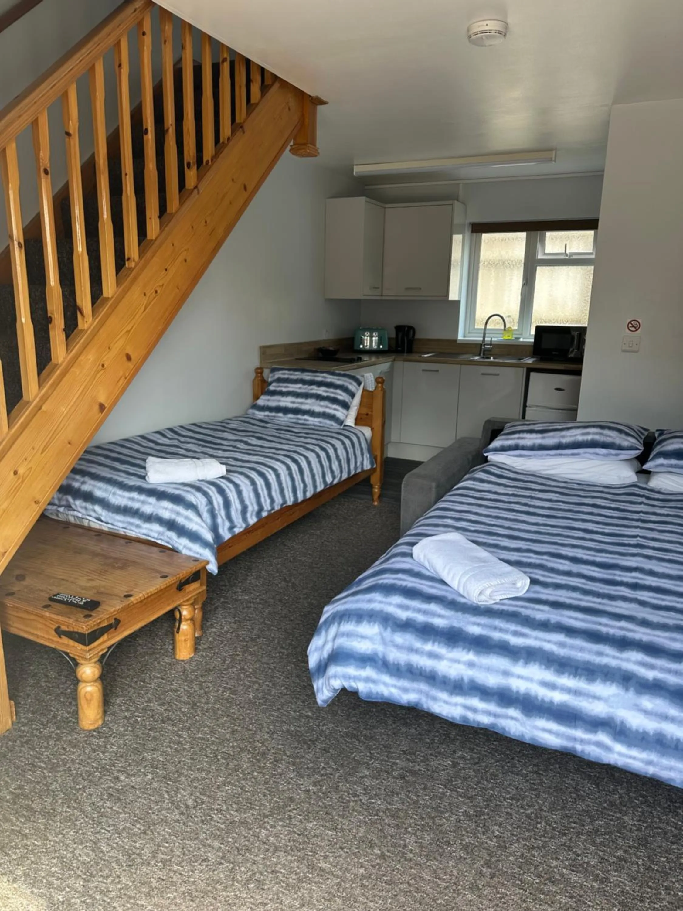 Bed in Forest Edge Motel