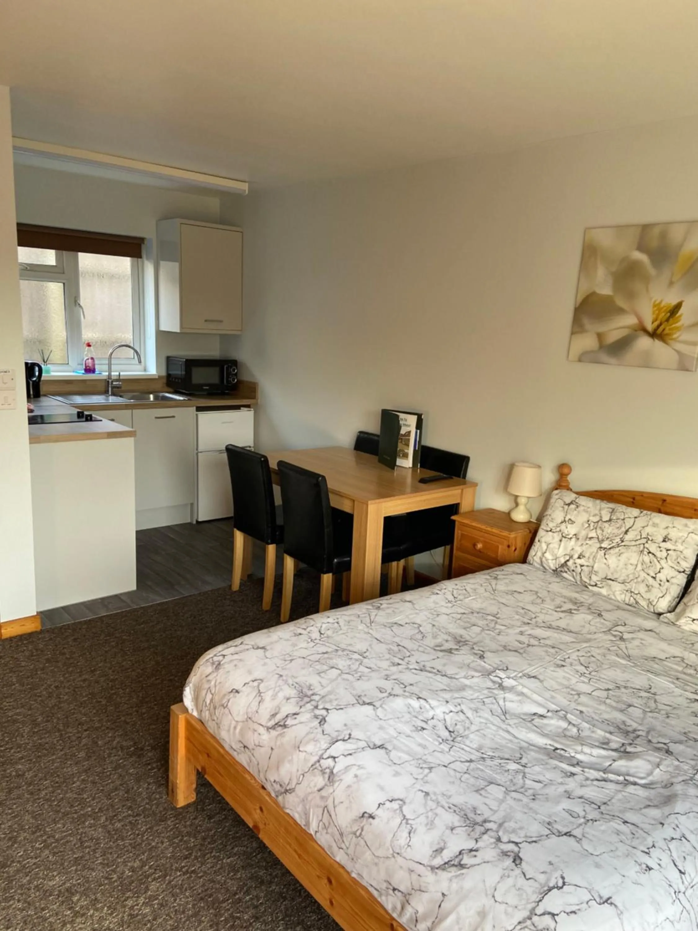 Bed in Forest Edge Motel