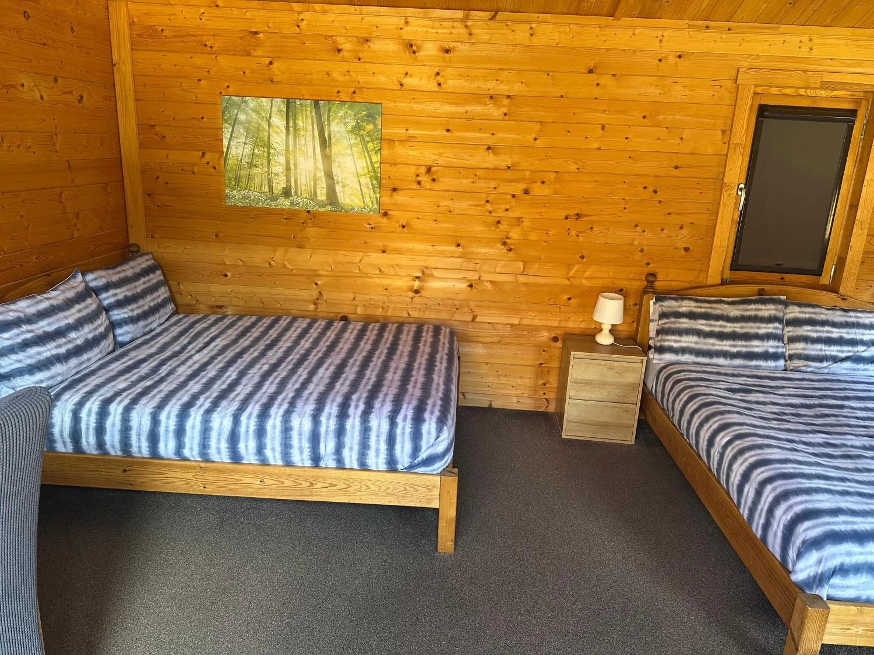 Bed in Forest Edge Motel