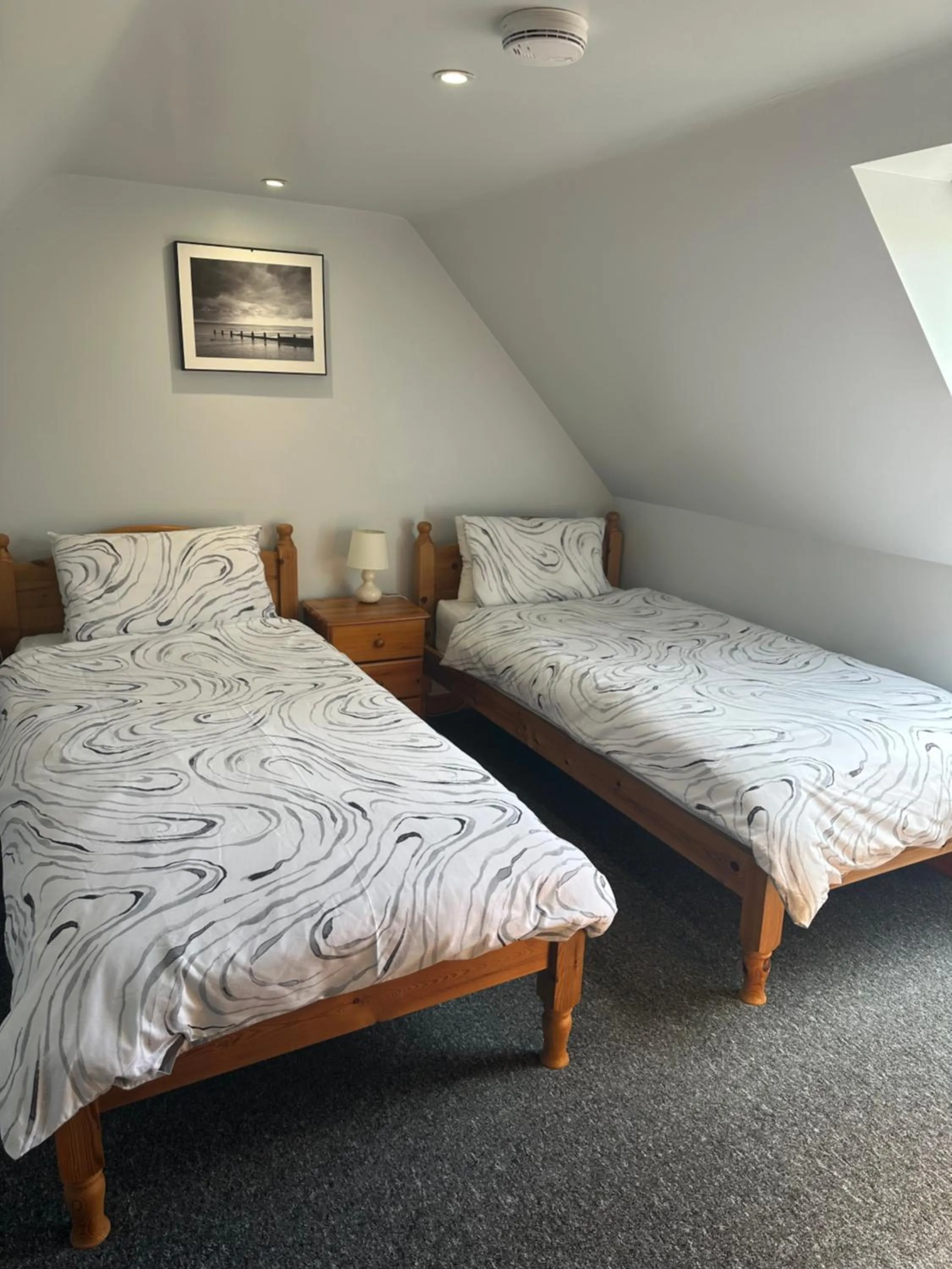 Bed in Forest Edge Motel