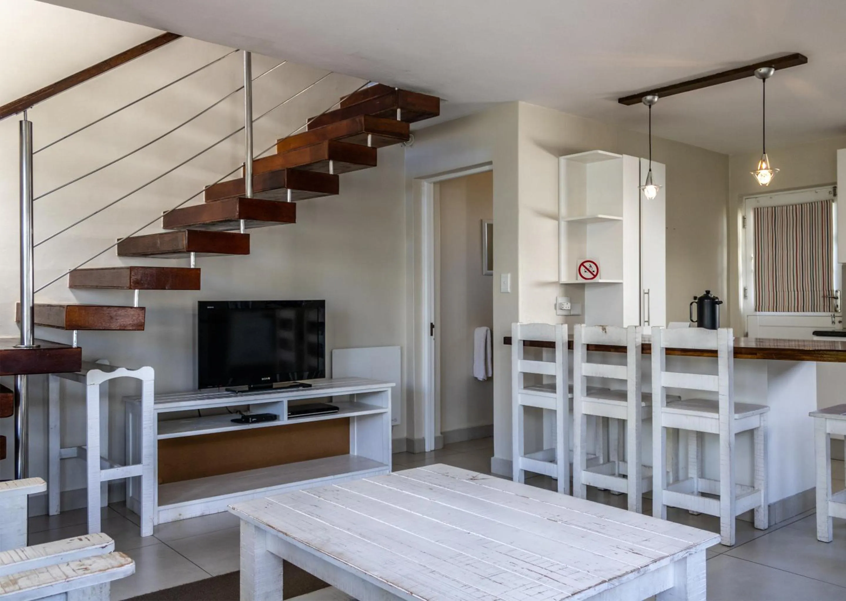 Communal lounge/ TV room in Oaklands On The Knoll by Dream Resorts