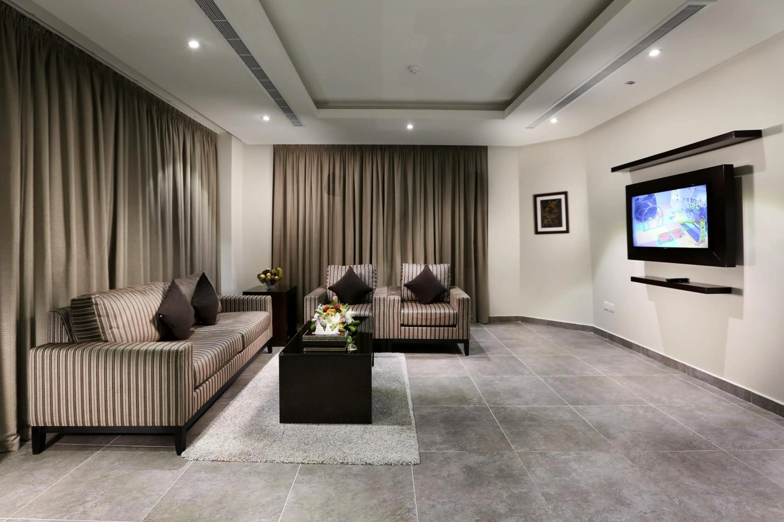 Communal lounge/ TV room in Aswar Al olaya for serviced Apartments