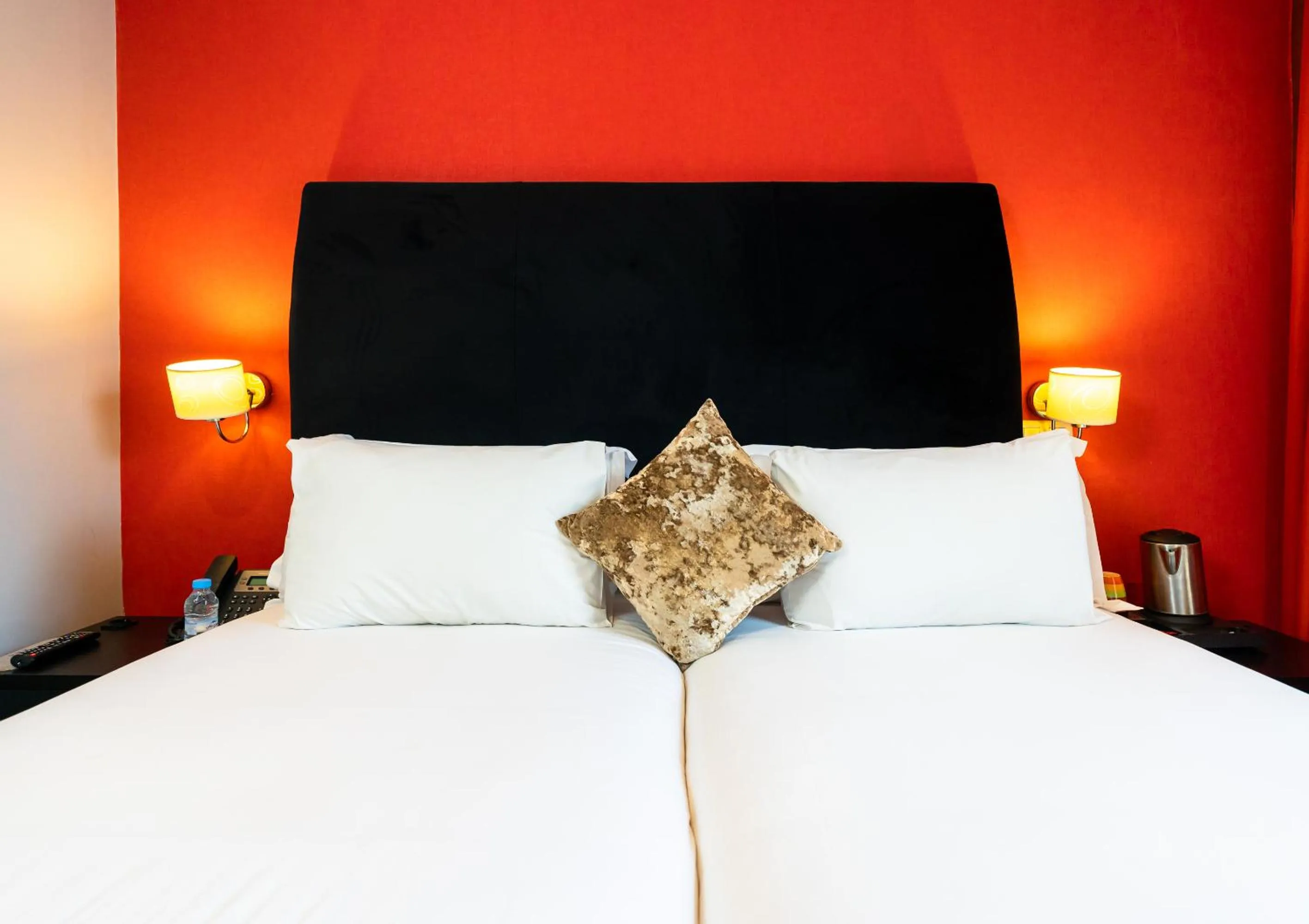 Bed in The Fourteen Luxury Boutique Hotel