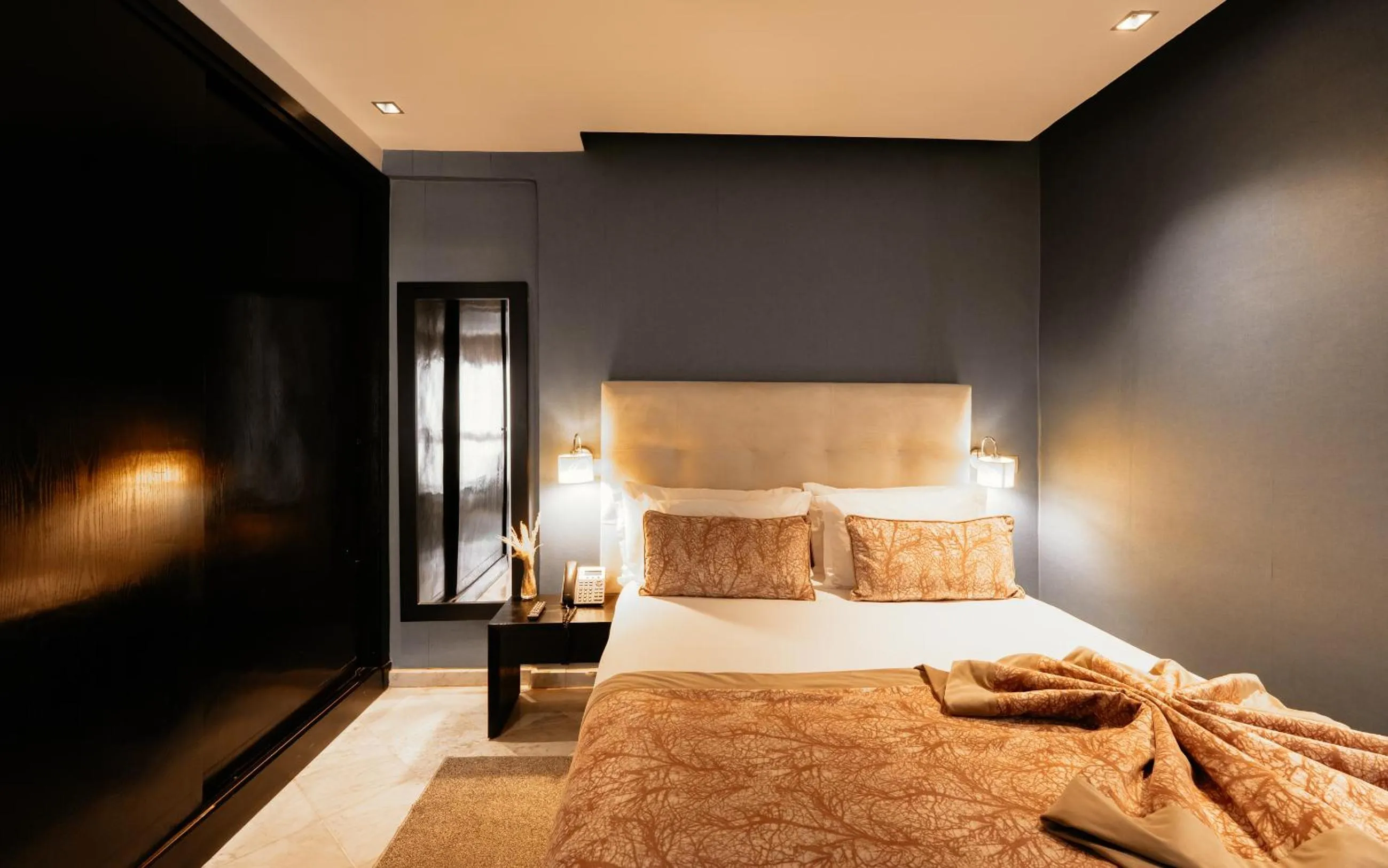 Bed in The Fourteen Luxury Boutique Hotel