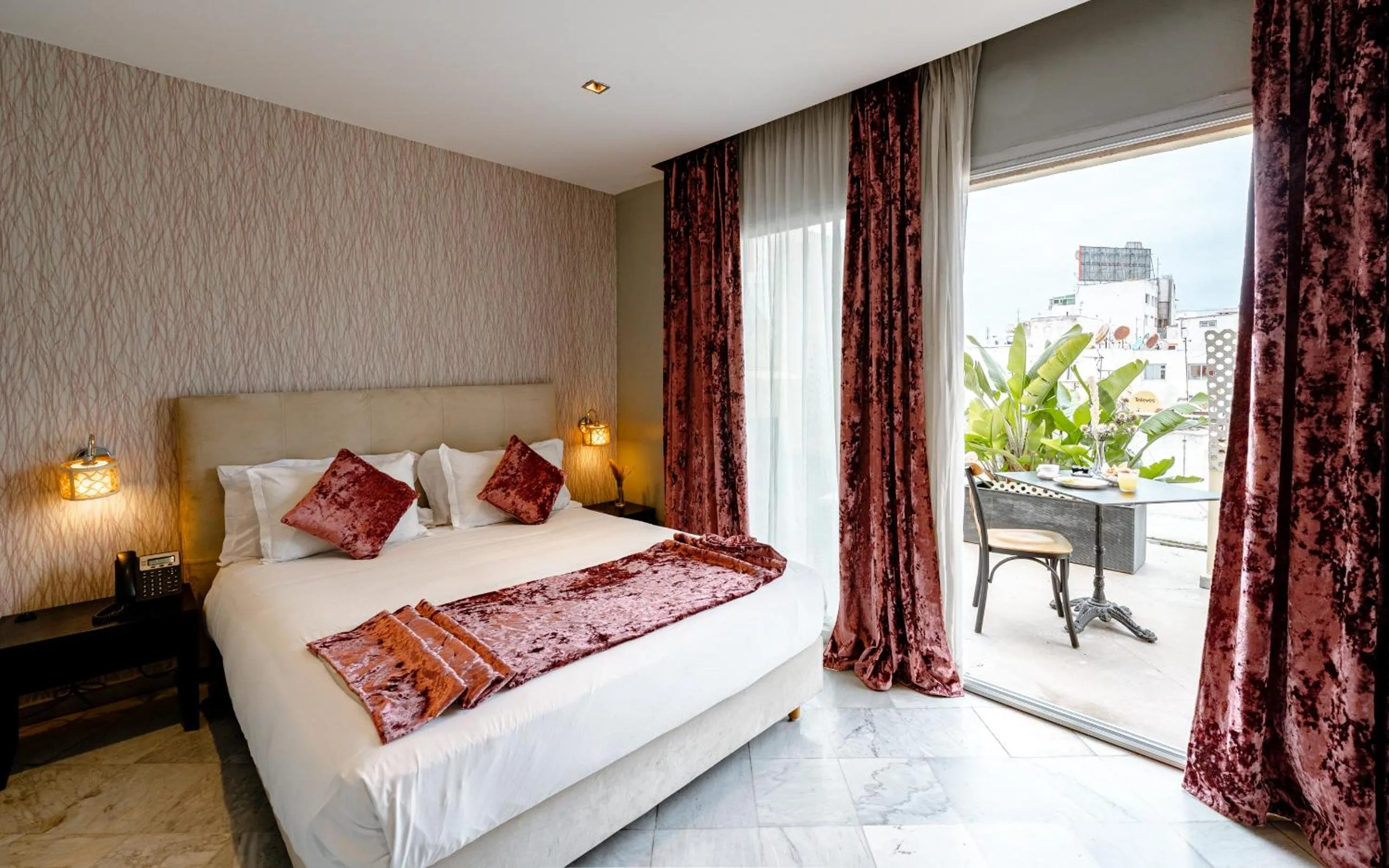 Bed in The Fourteen Luxury Boutique Hotel