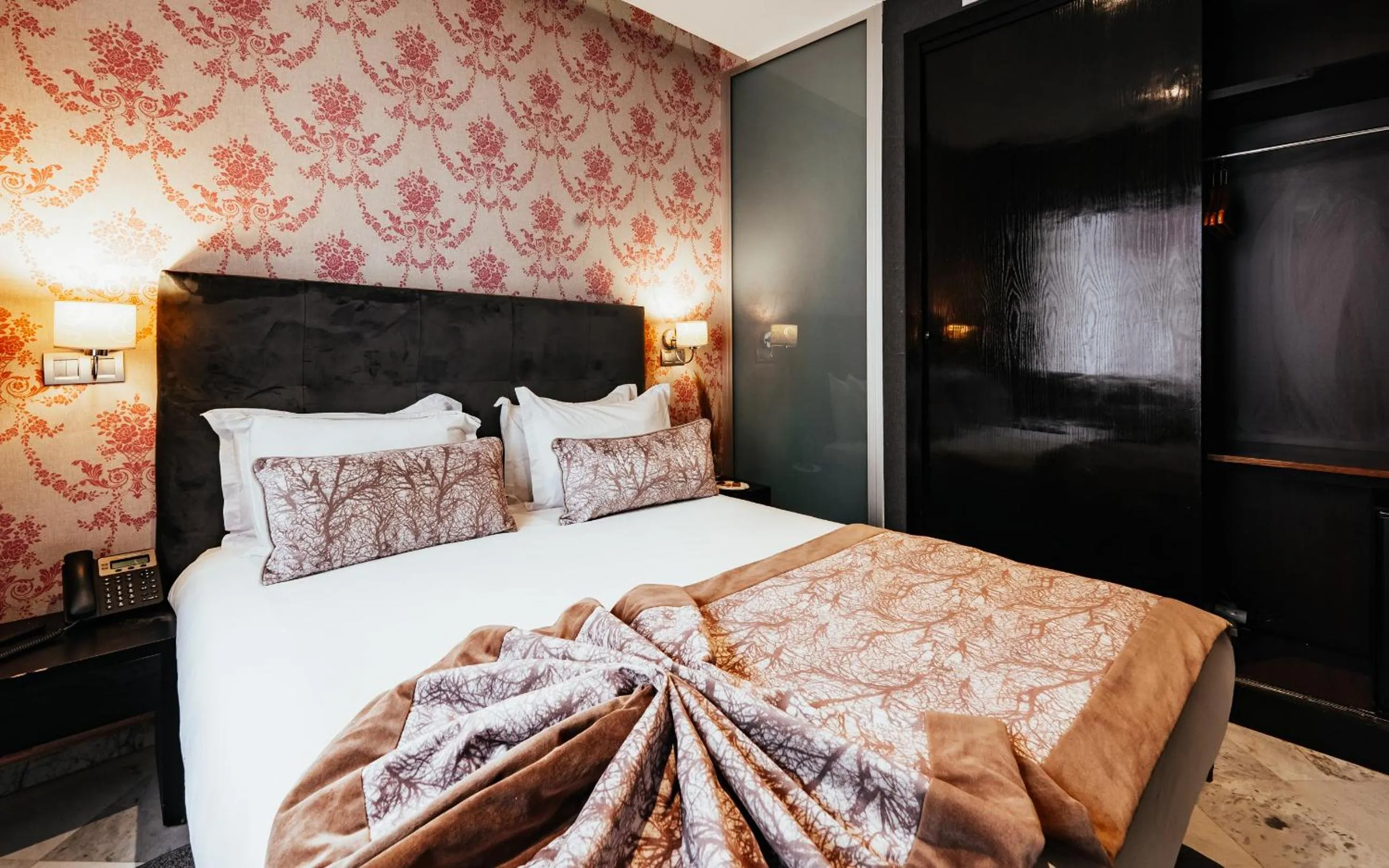 Bed in The Fourteen Luxury Boutique Hotel