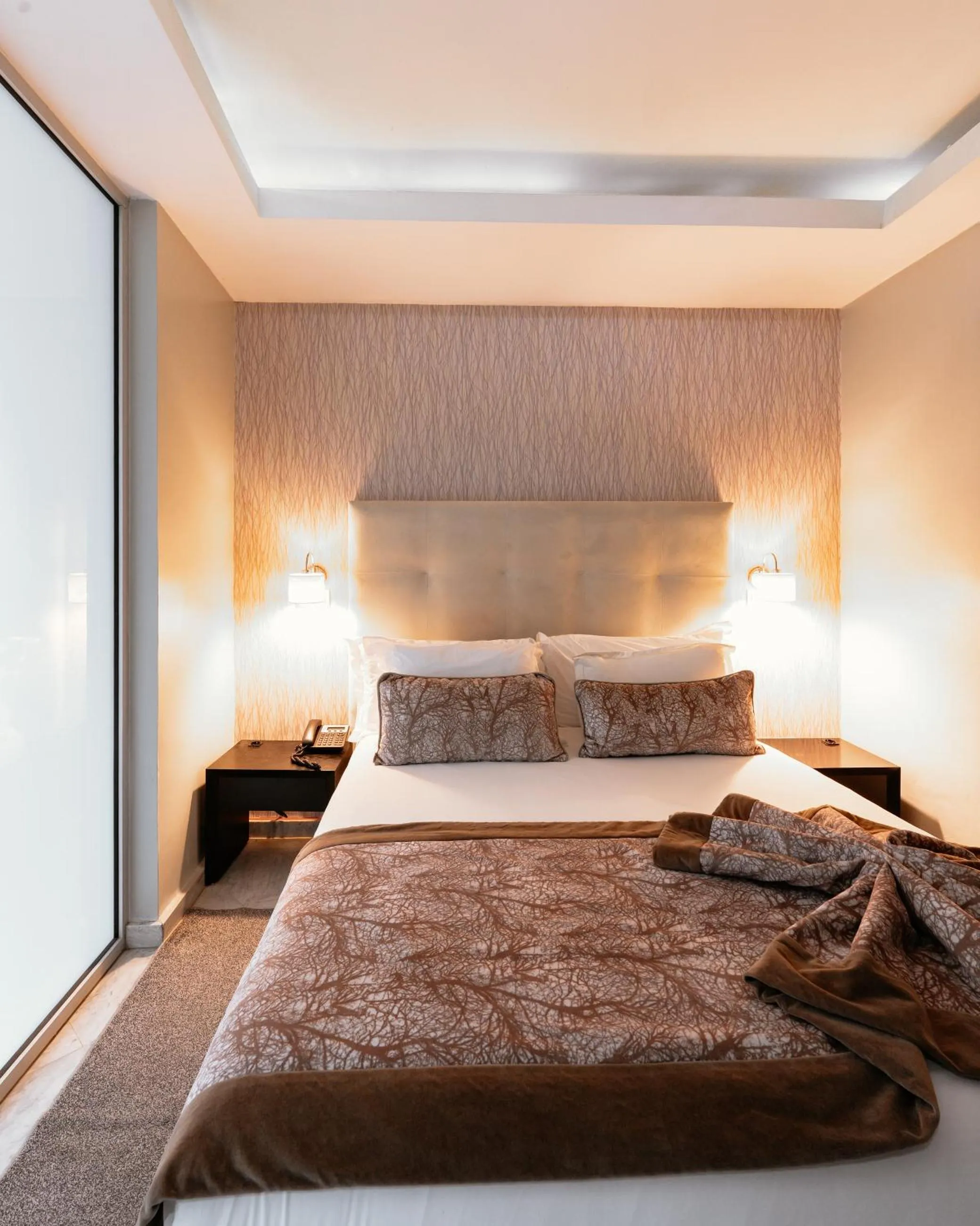 Bed in The Fourteen Luxury Boutique Hotel