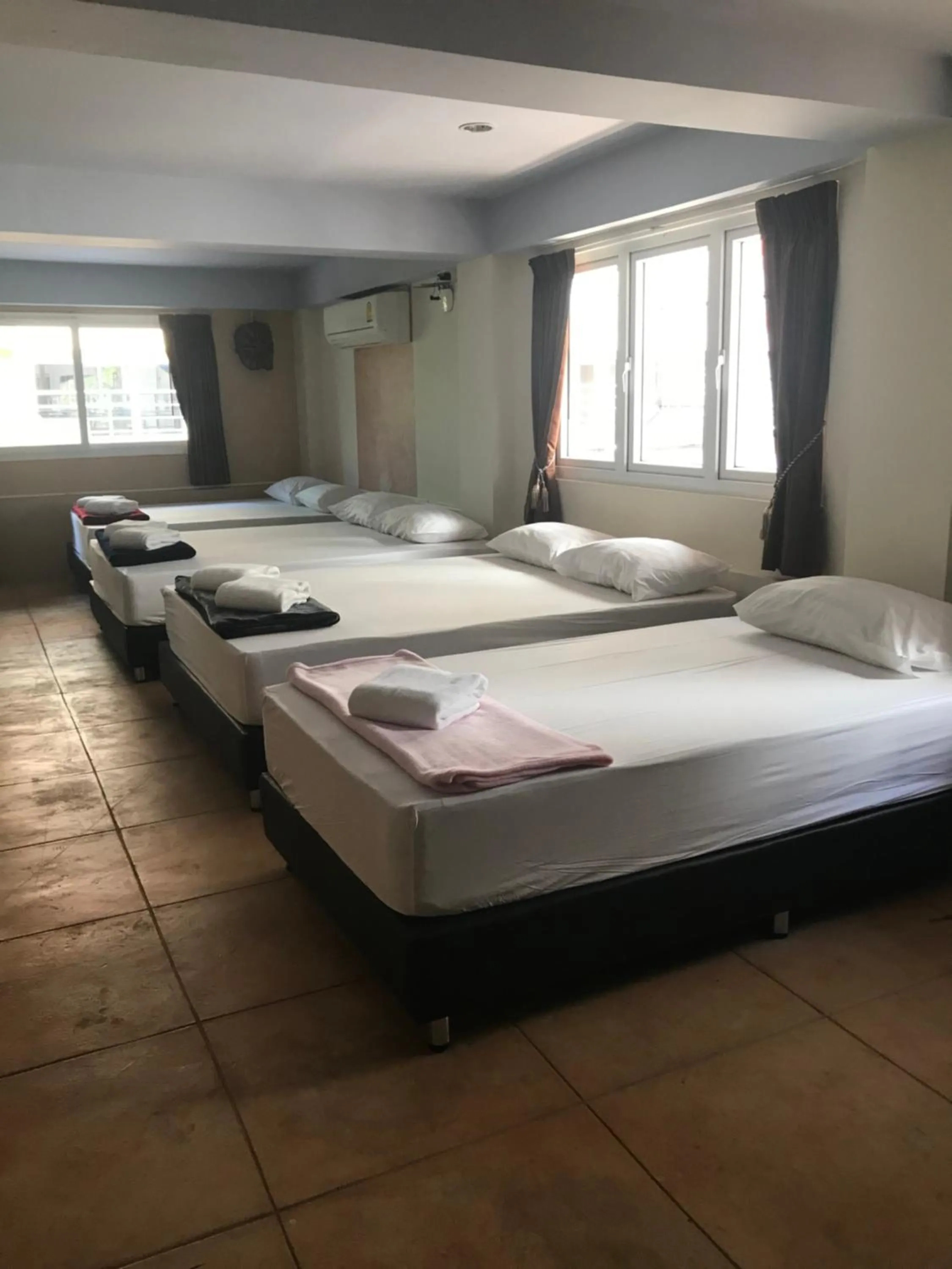 Bed in Arcadia Maephim Serviced Apartments