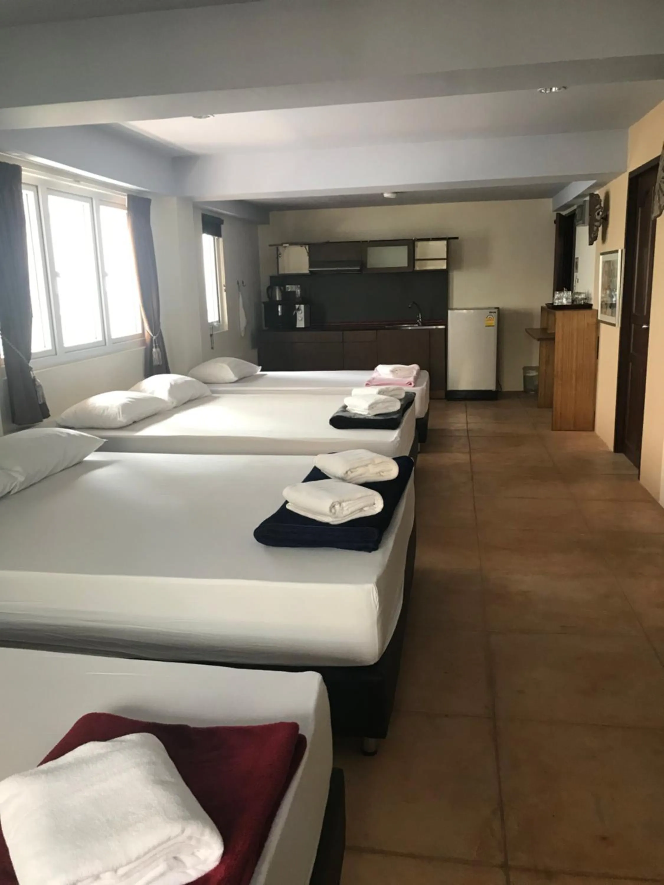 Bed in Arcadia Maephim Serviced Apartments