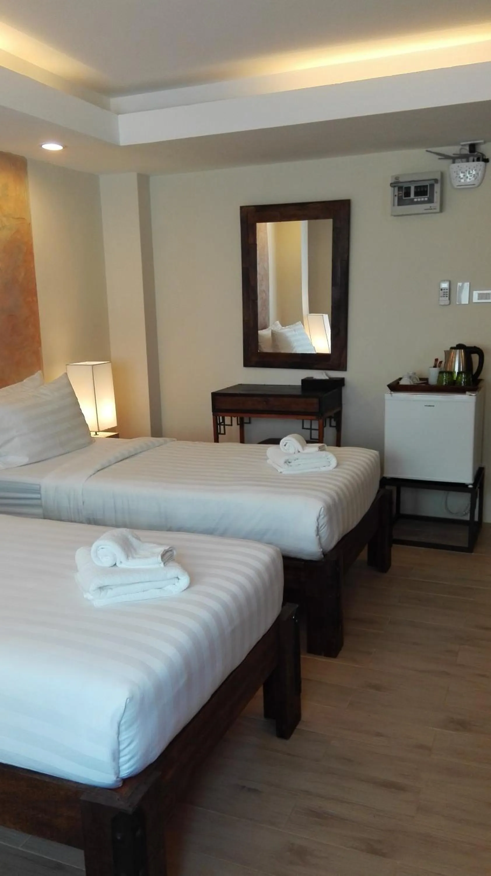 Bed in Arcadia Maephim Serviced Apartments