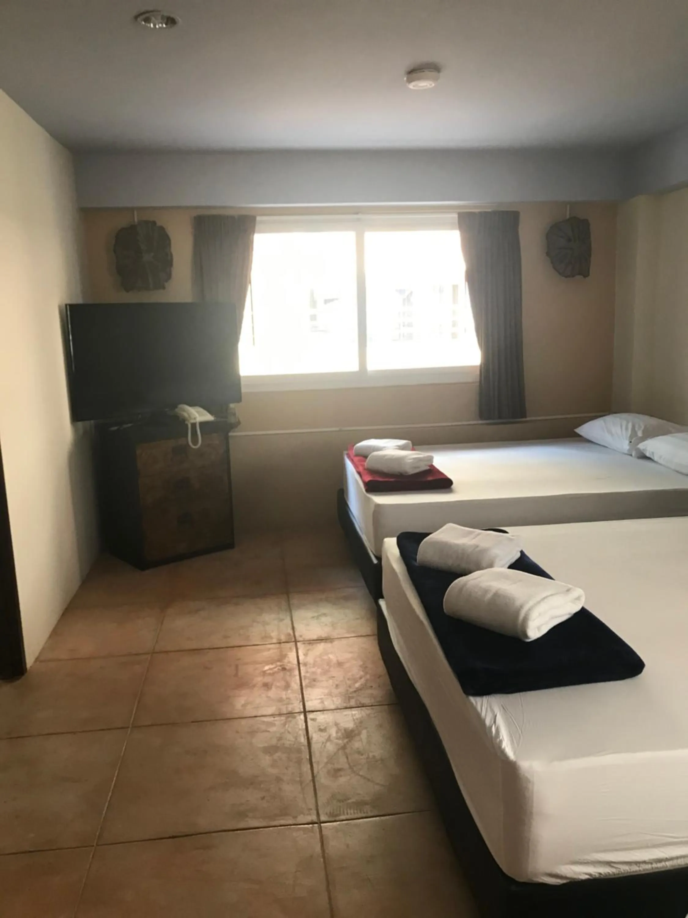 Bed in Arcadia Maephim Serviced Apartments