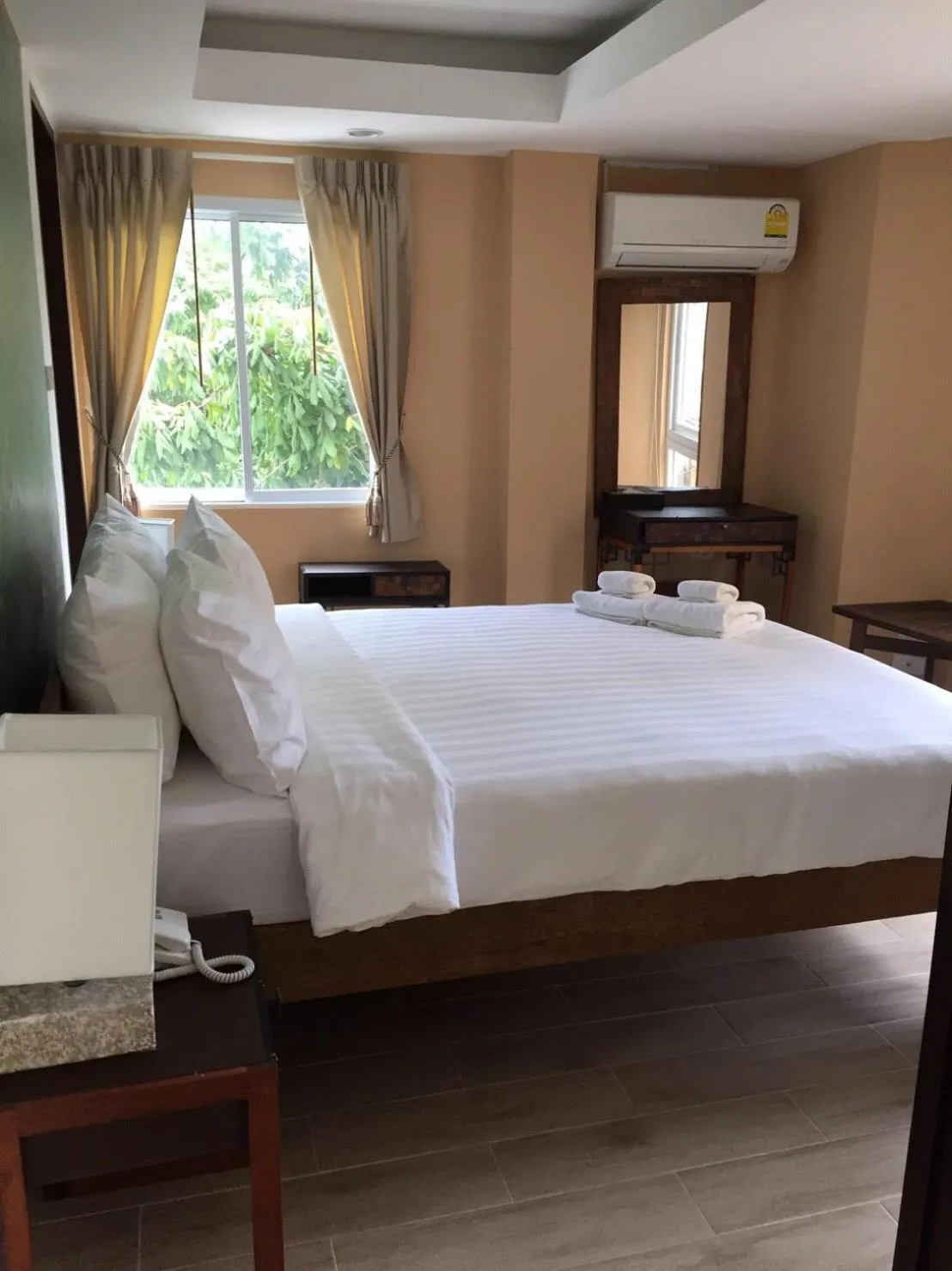 Bedroom, Bed in Arcadia Maephim Serviced Apartments