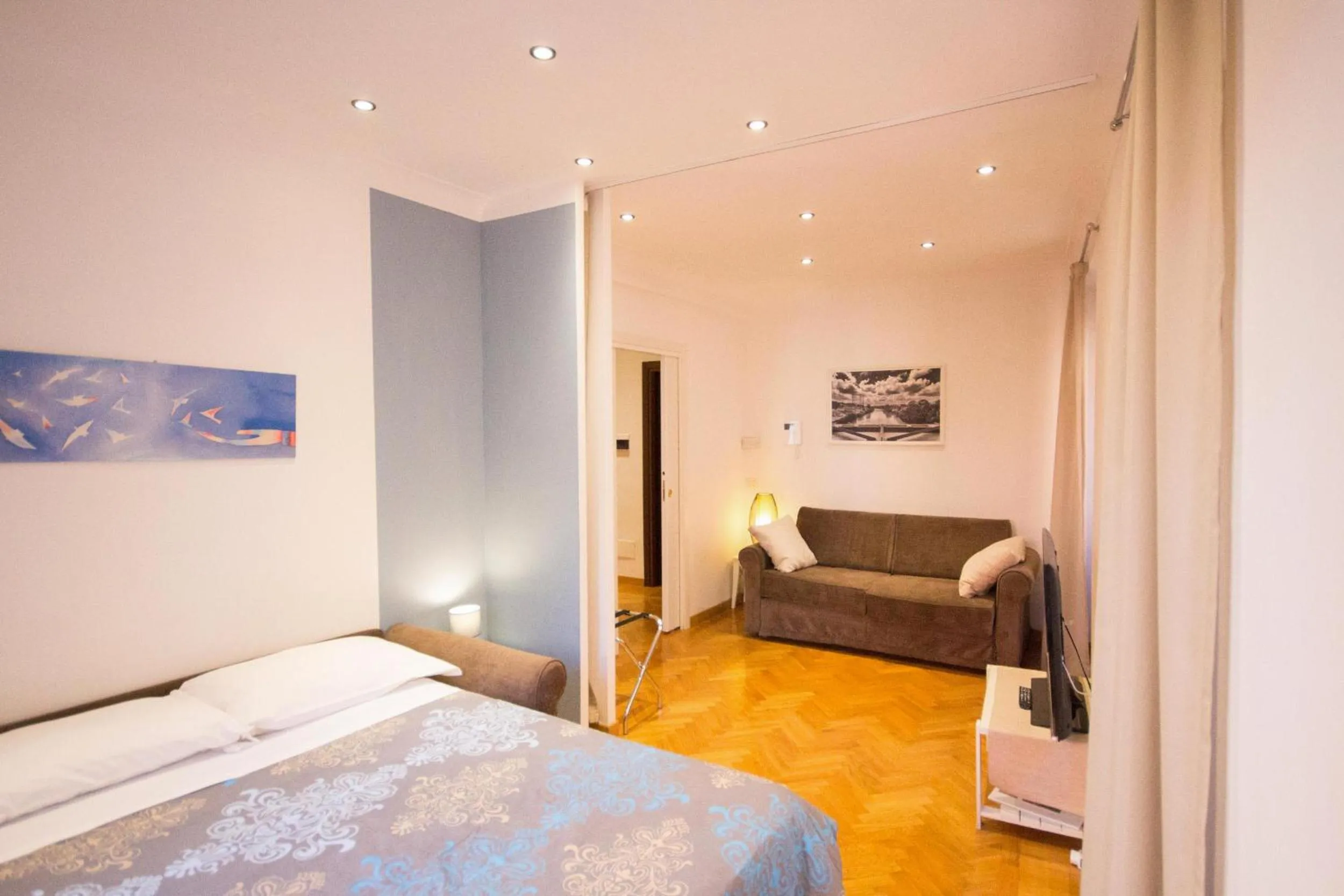 Living room, Bed in Polacchi 42 Apartment