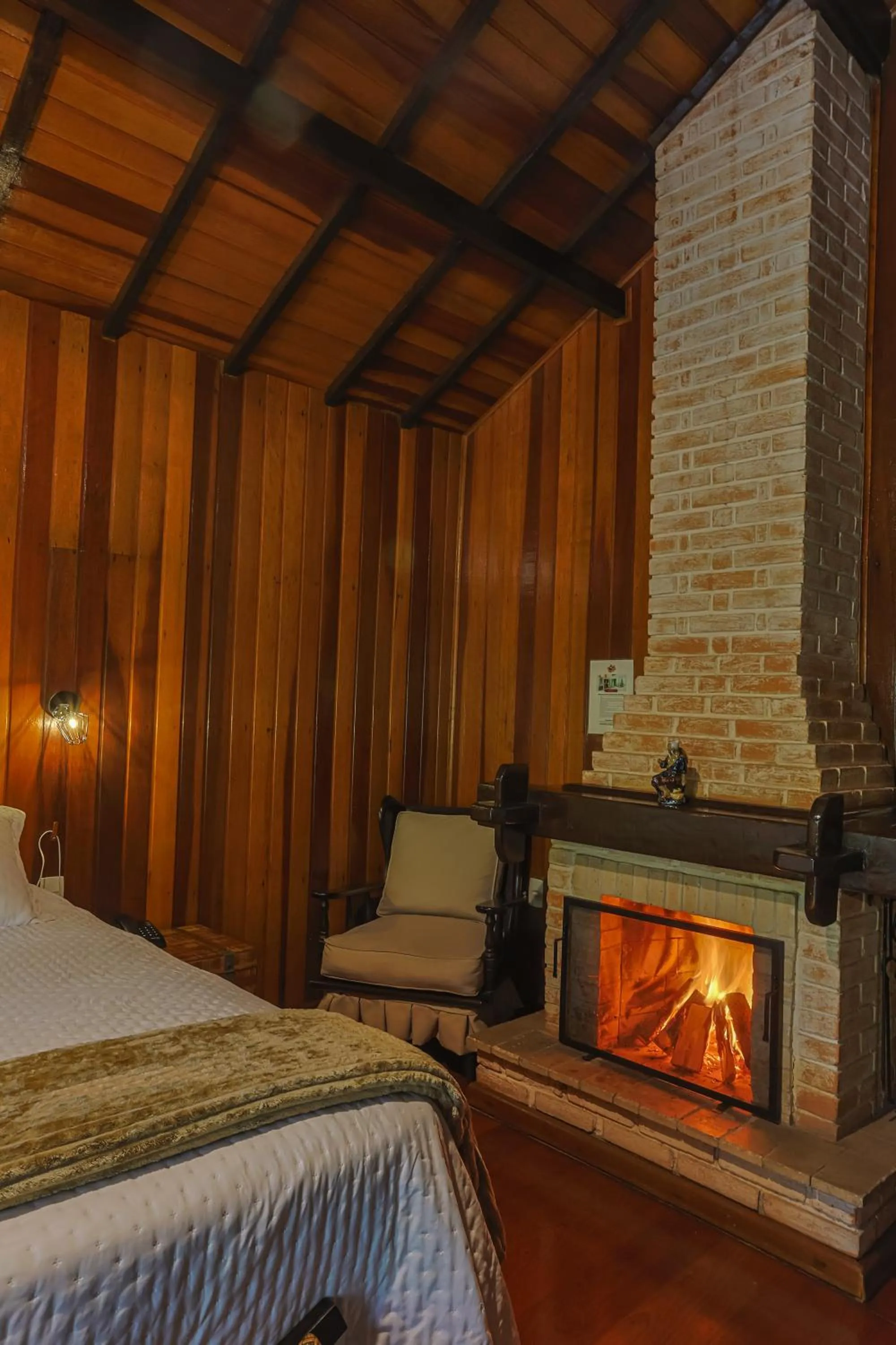 fireplace, Bed in Pousada & Spa Cantos e Contos