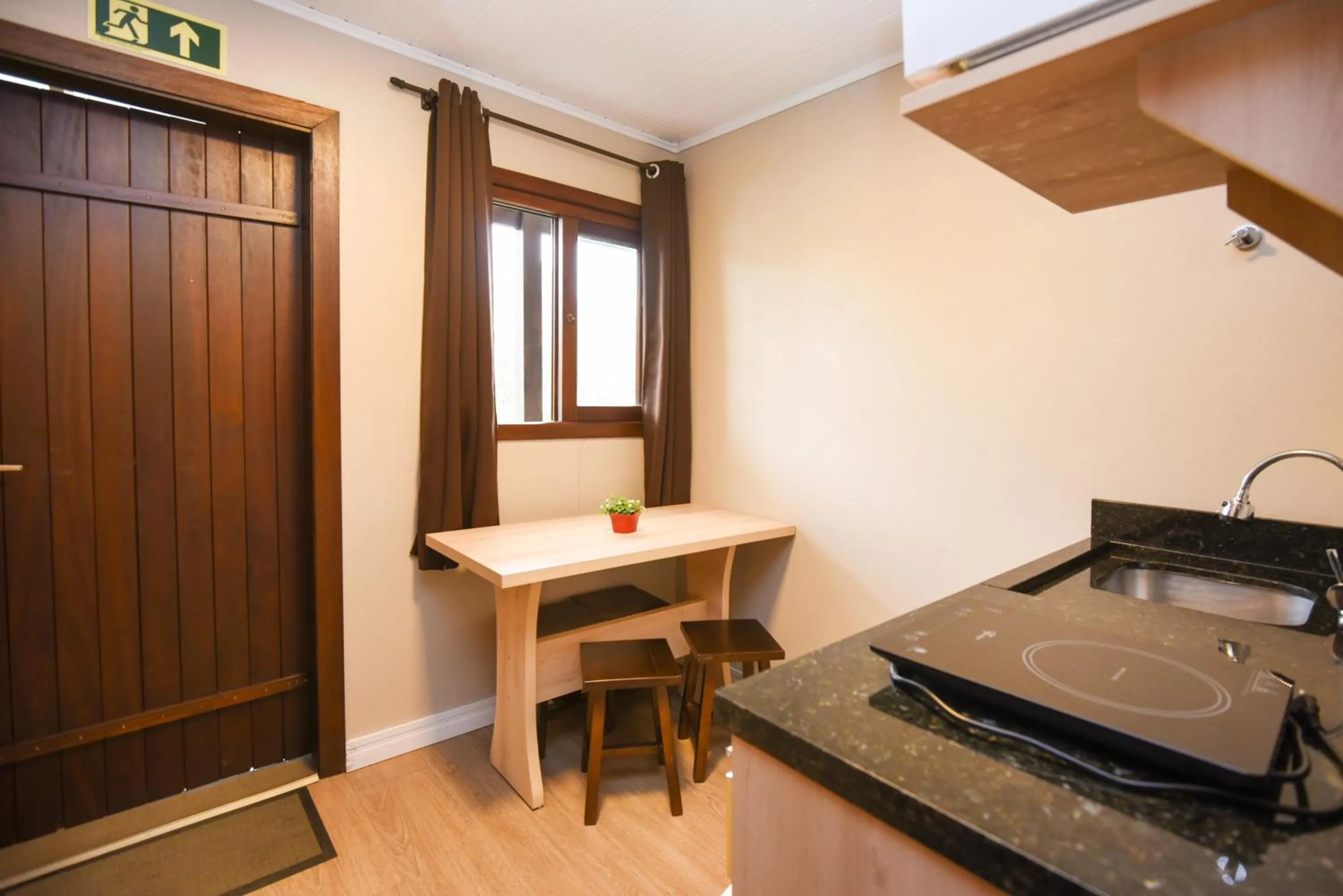 Kitchen or kitchenette in Pousada Três Pinheiros