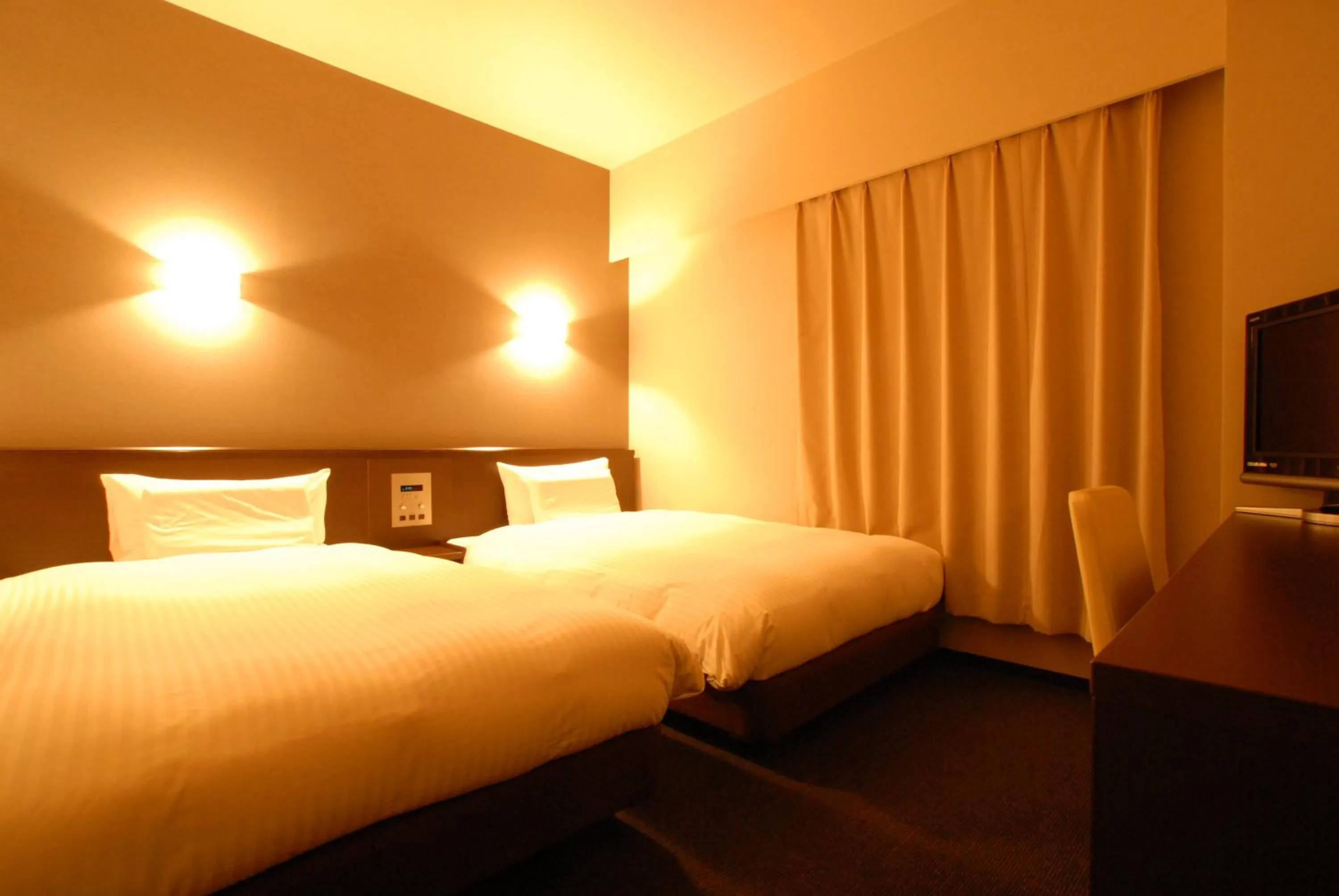 Bed in AB Hotel Toyota Motomachi