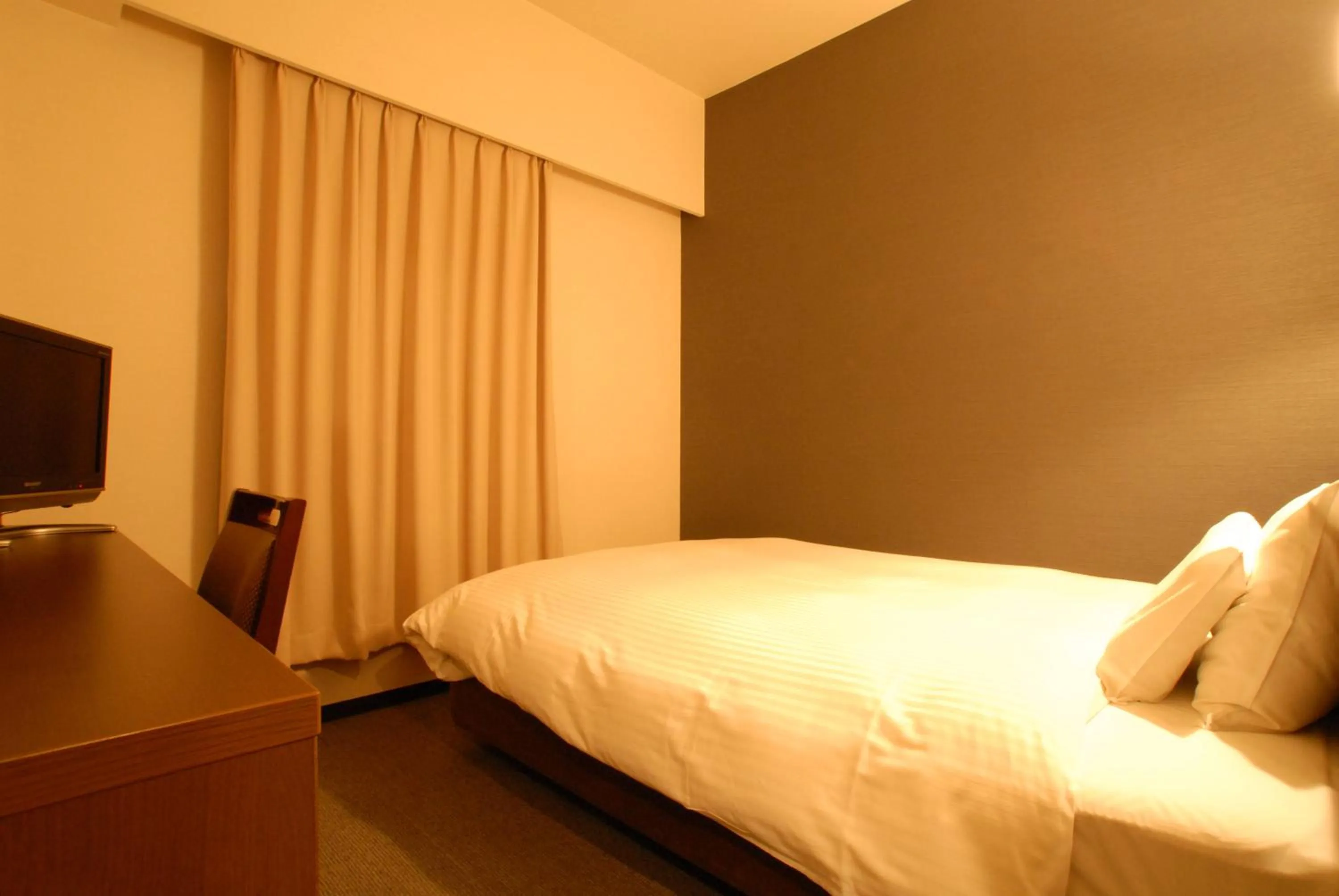 Bed in AB Hotel Toyota Motomachi