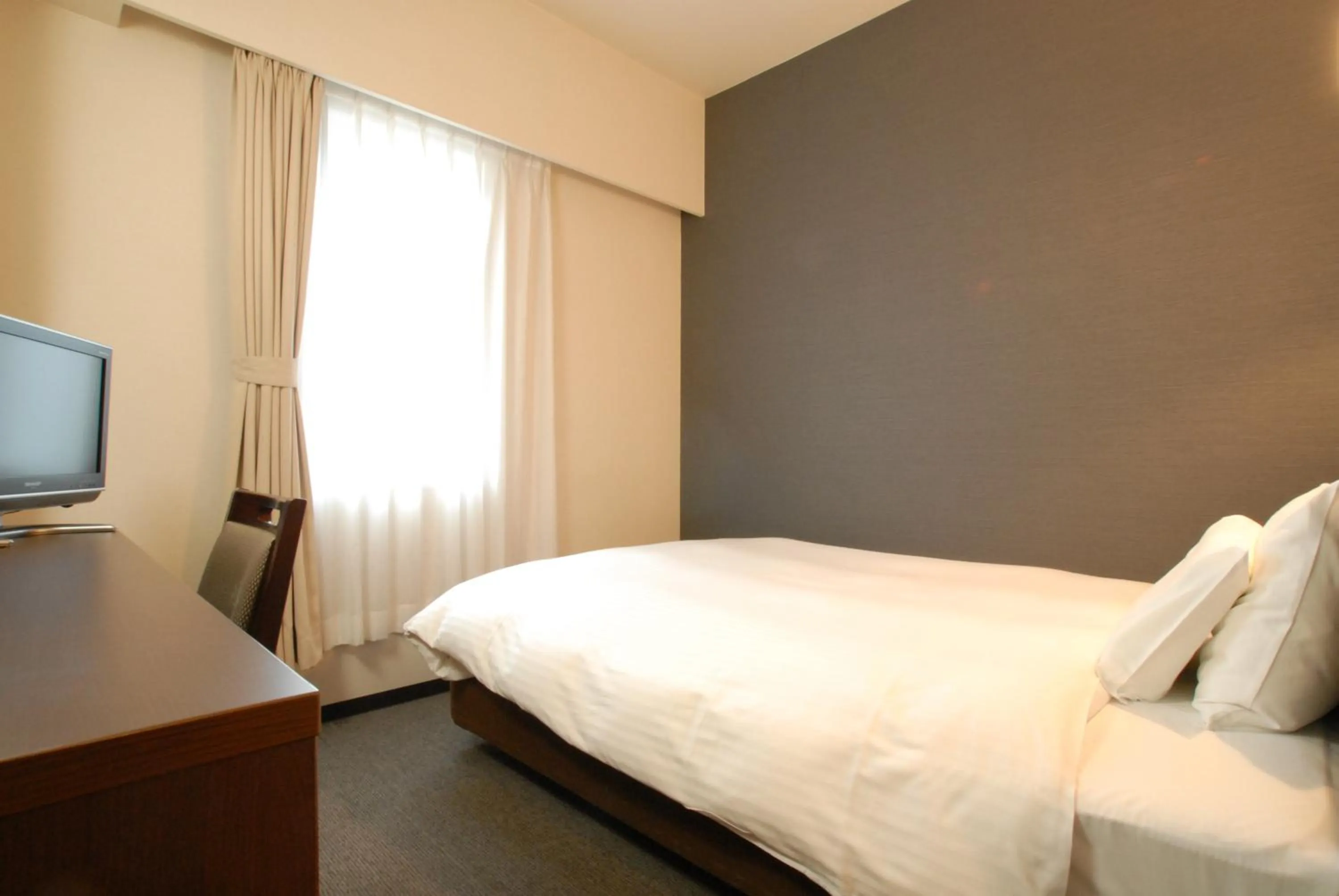 Photo of the whole room, Bed in AB Hotel Toyota Motomachi