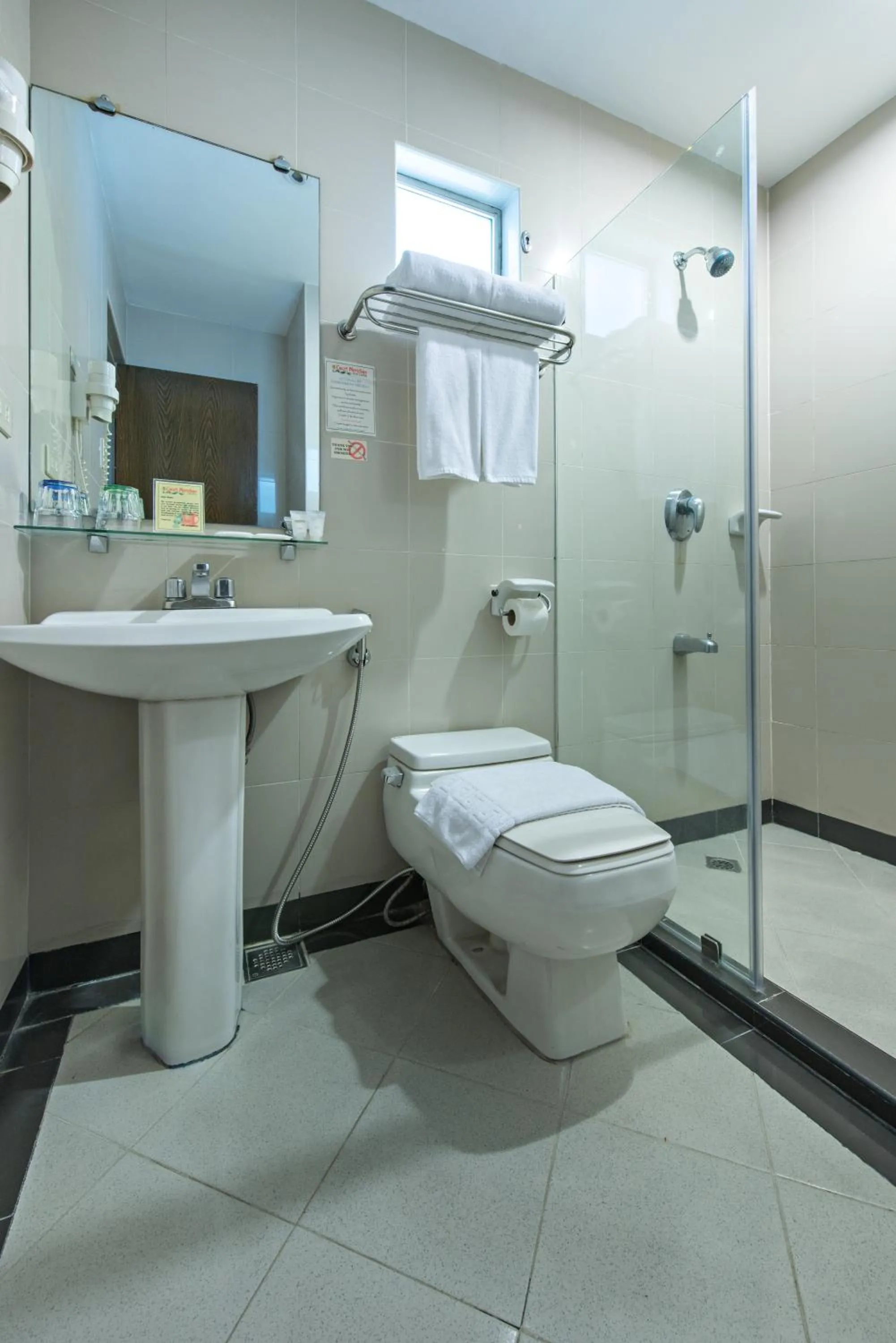 Bathroom in Court Meridian Hotel & Suites