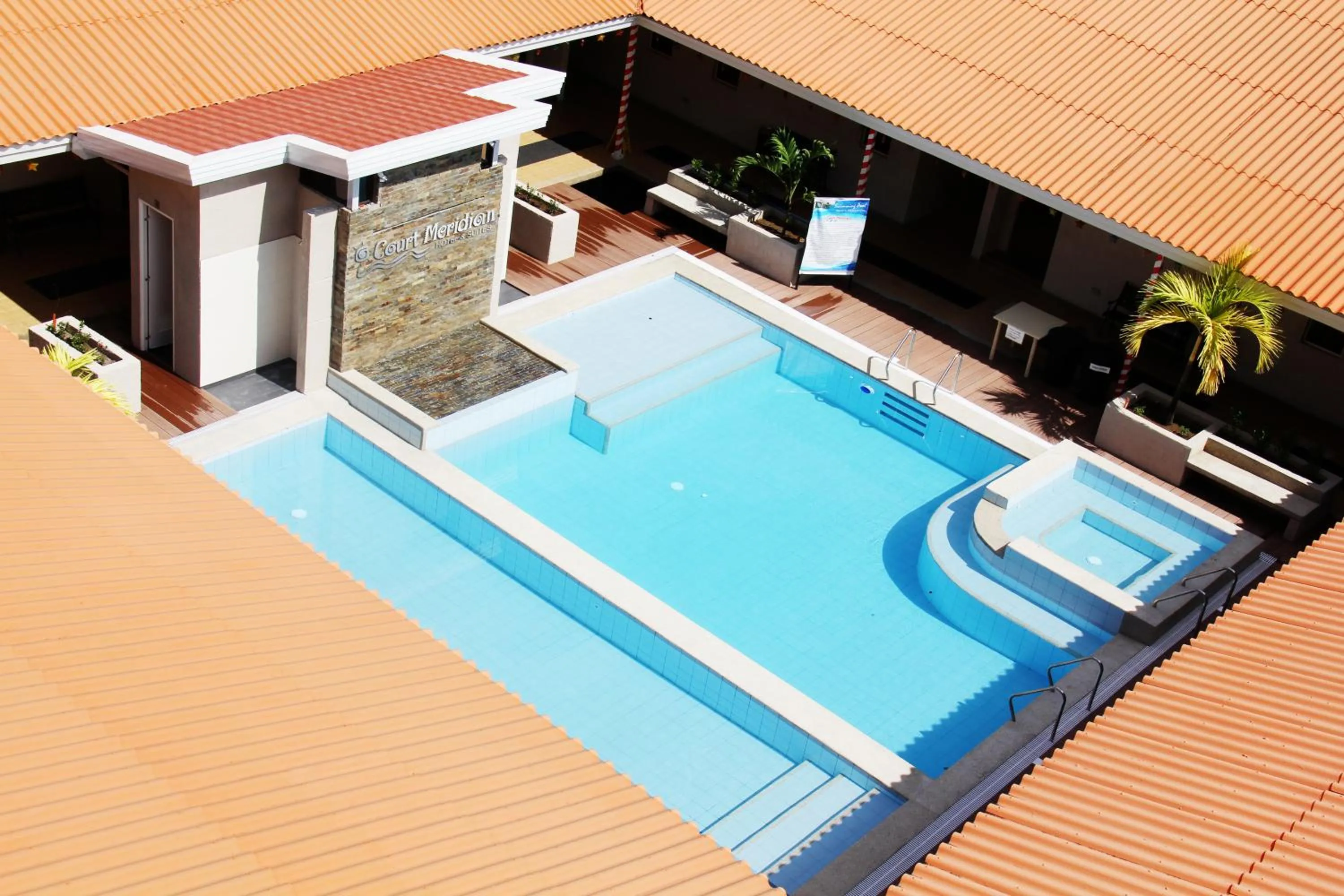 Swimming pool in Court Meridian Hotel & Suites