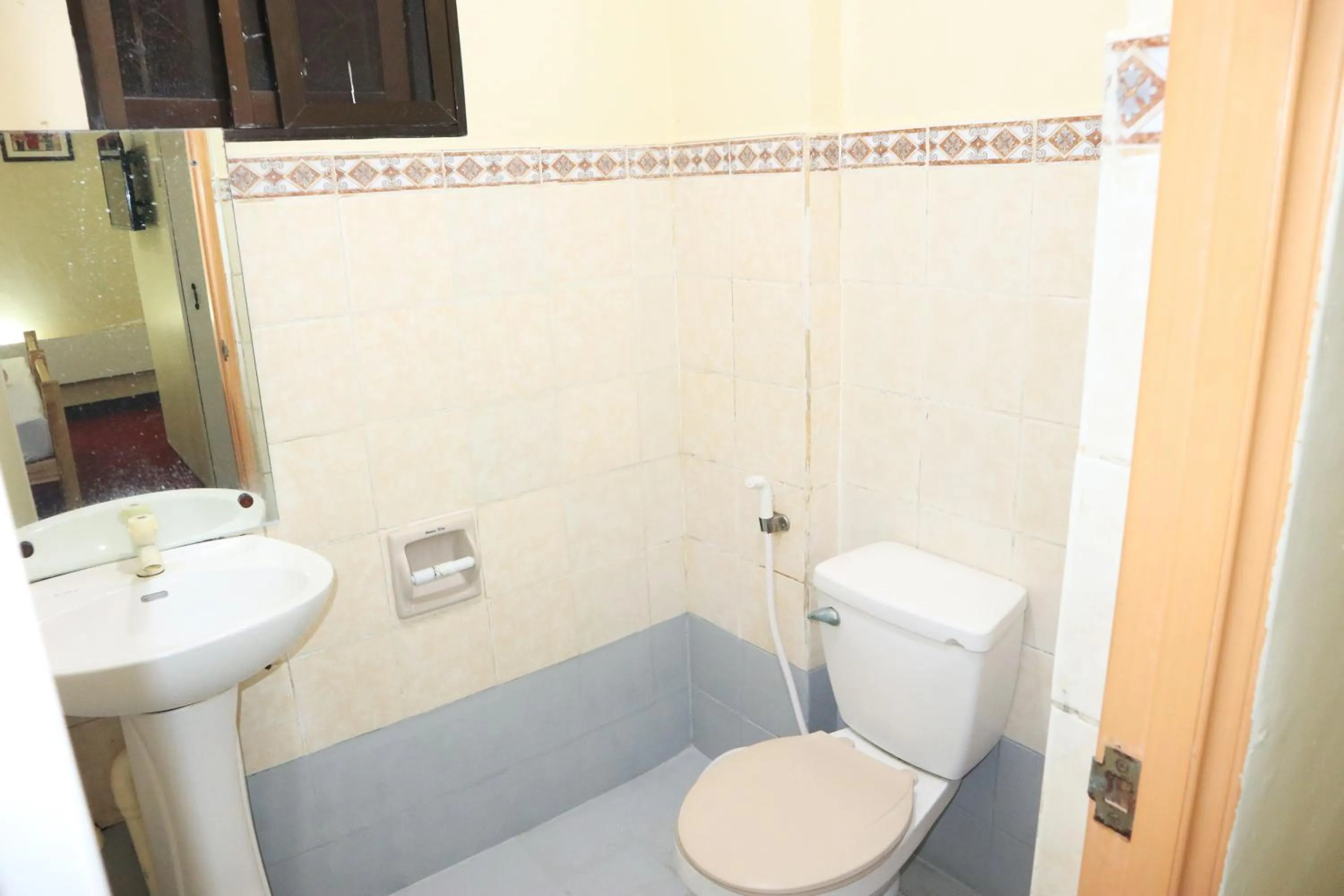 Toilet in Cool Martin Family Hotel and Resort