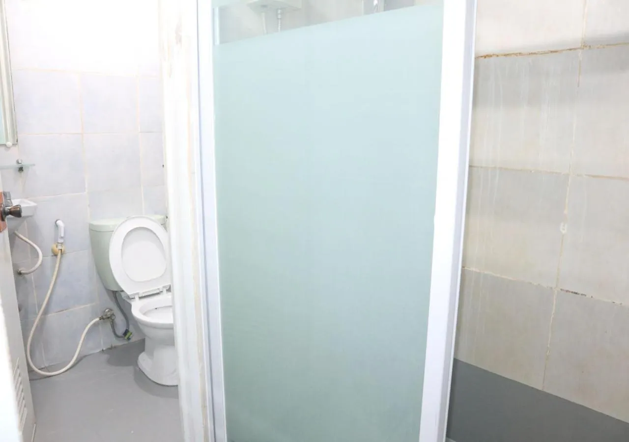 Toilet in Cool Martin Family Hotel and Resort